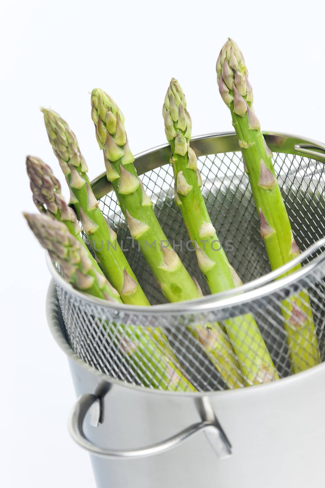 green asparagus in pot