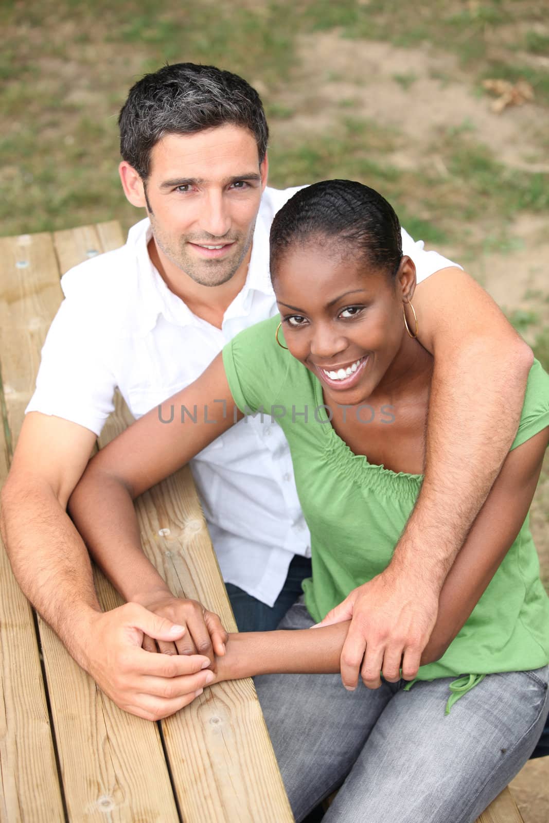 portrait of a couple outdoors by phovoir