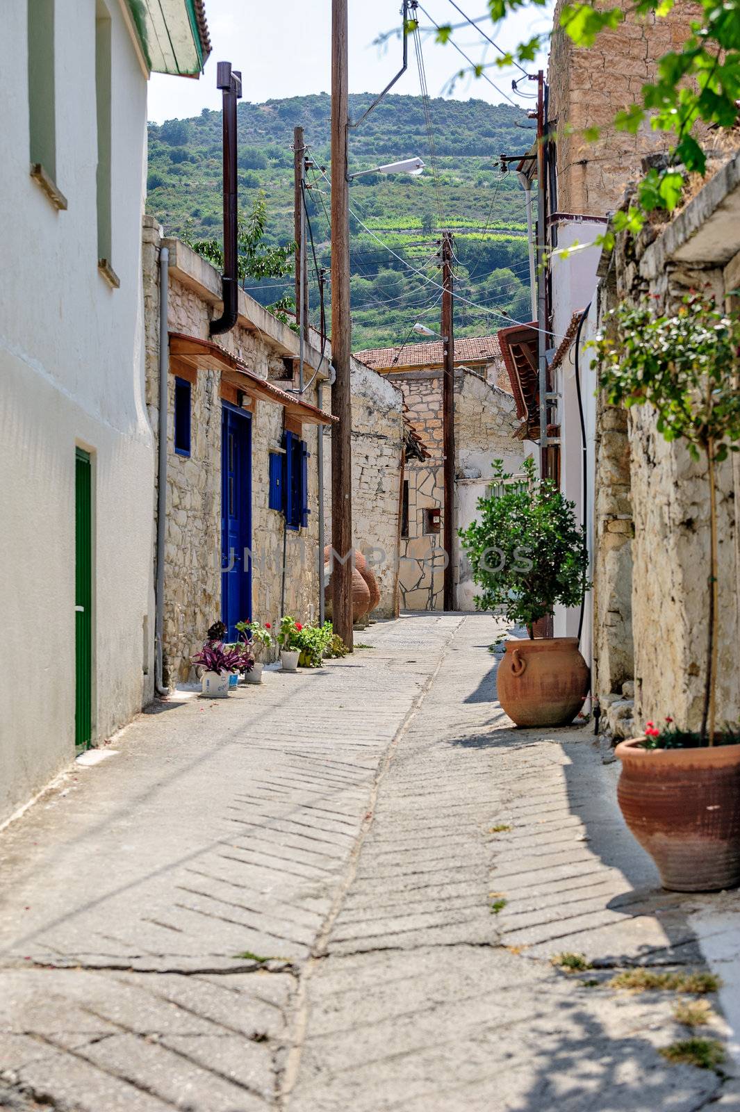 Narrow street in old village Omodos on Cyprus