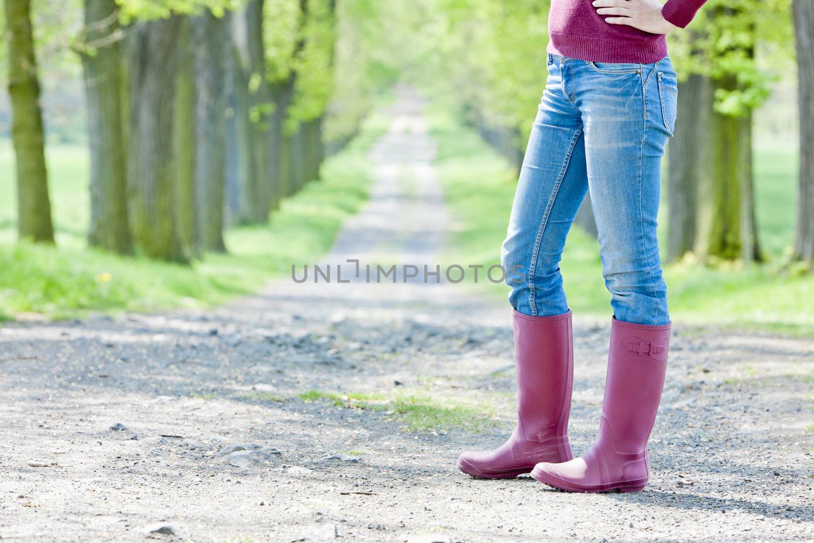 detail of woman wearing rubber boots