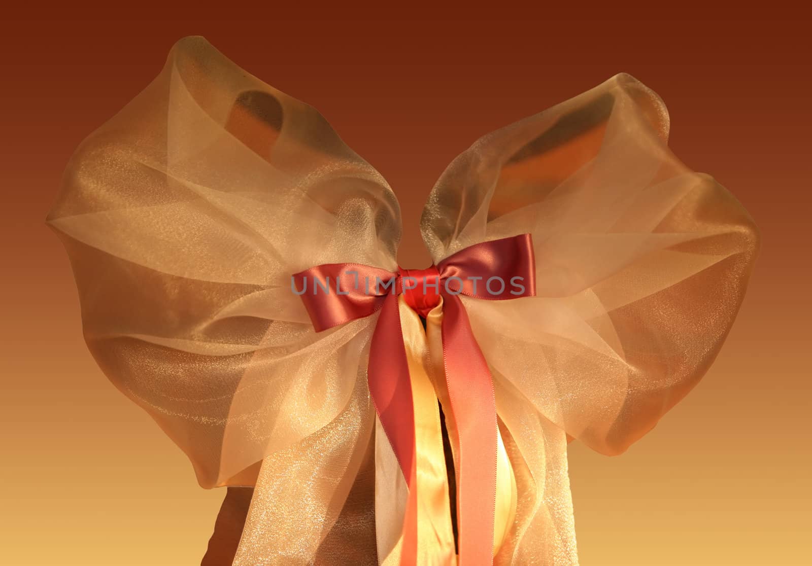 Red-yellow bow on a red-yellow background
