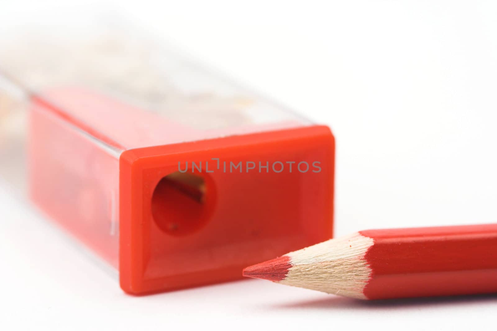 red pencil and sharpener by alexkosev