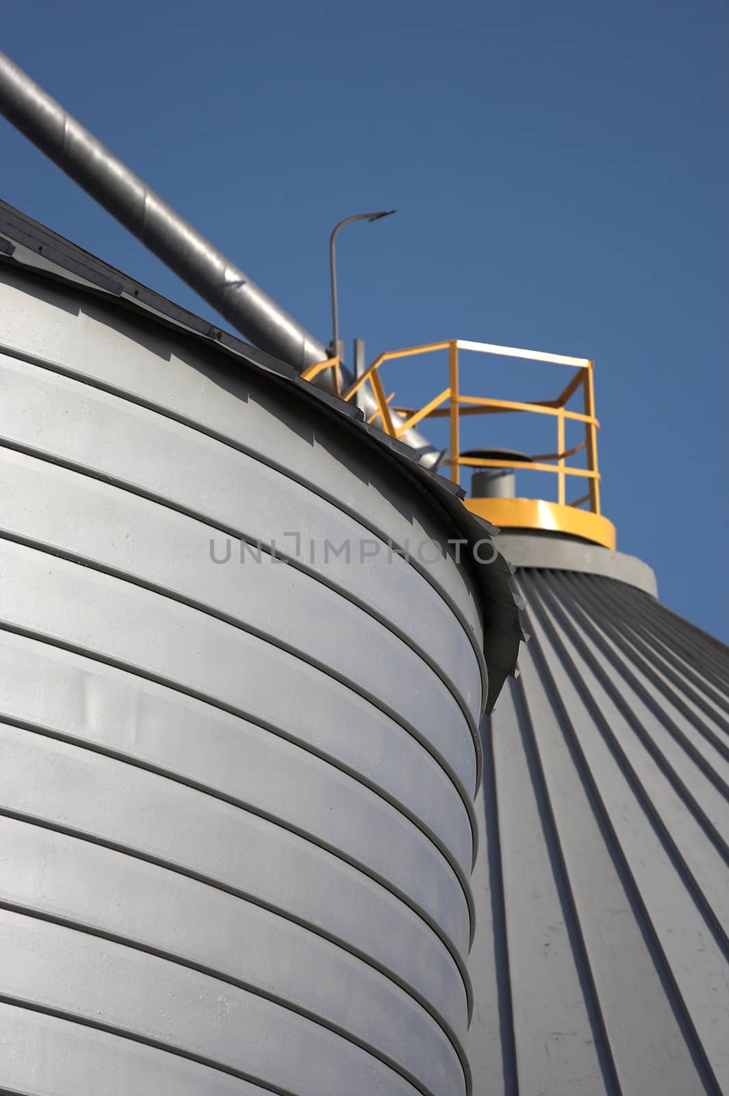 Grain reservoir detail  against a blue sky