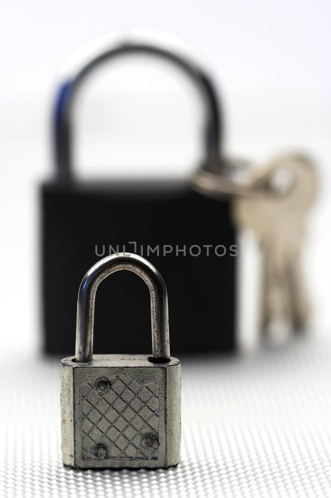 Padlocks and keys close up