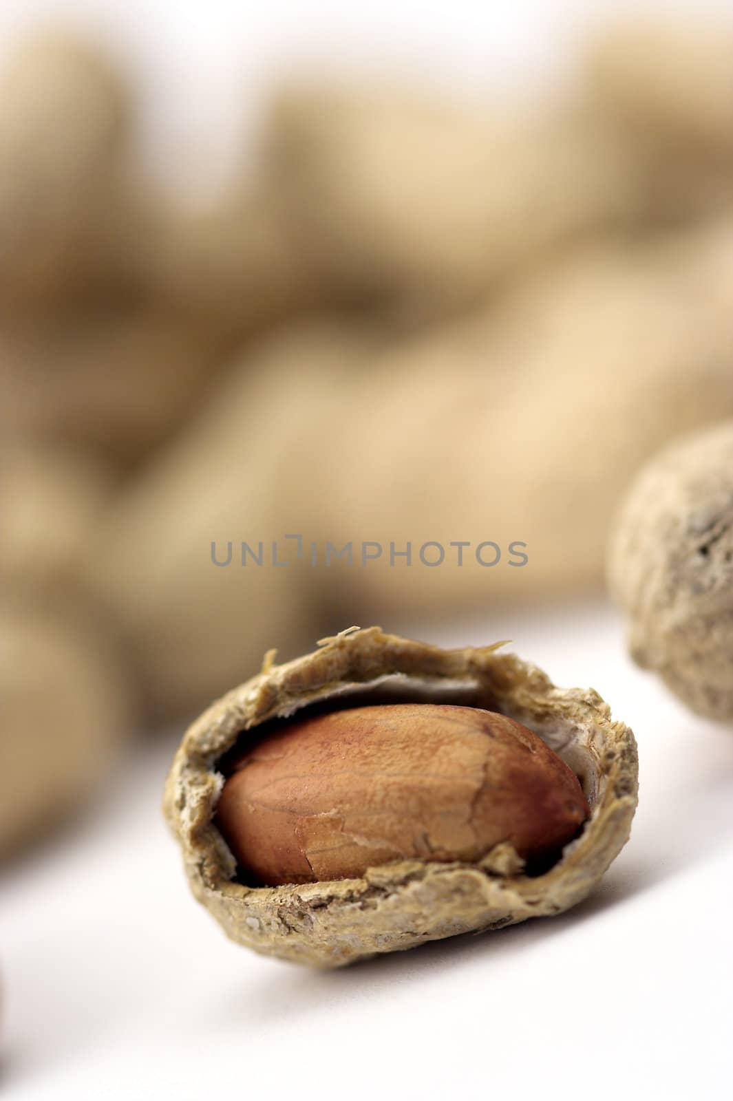 Peanuts close up over white