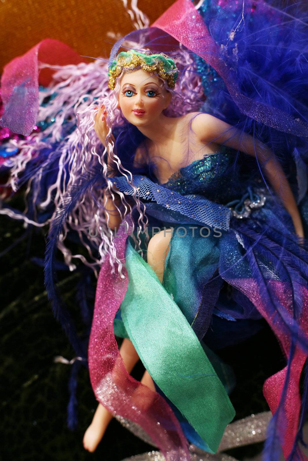 The doll - fairy with wings on a New Year tree