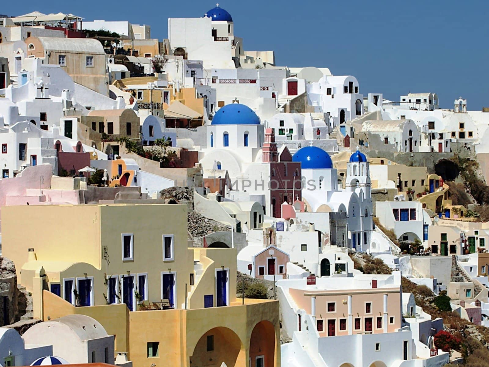 a panoramic view of Oia, on Santorini's island in Greece