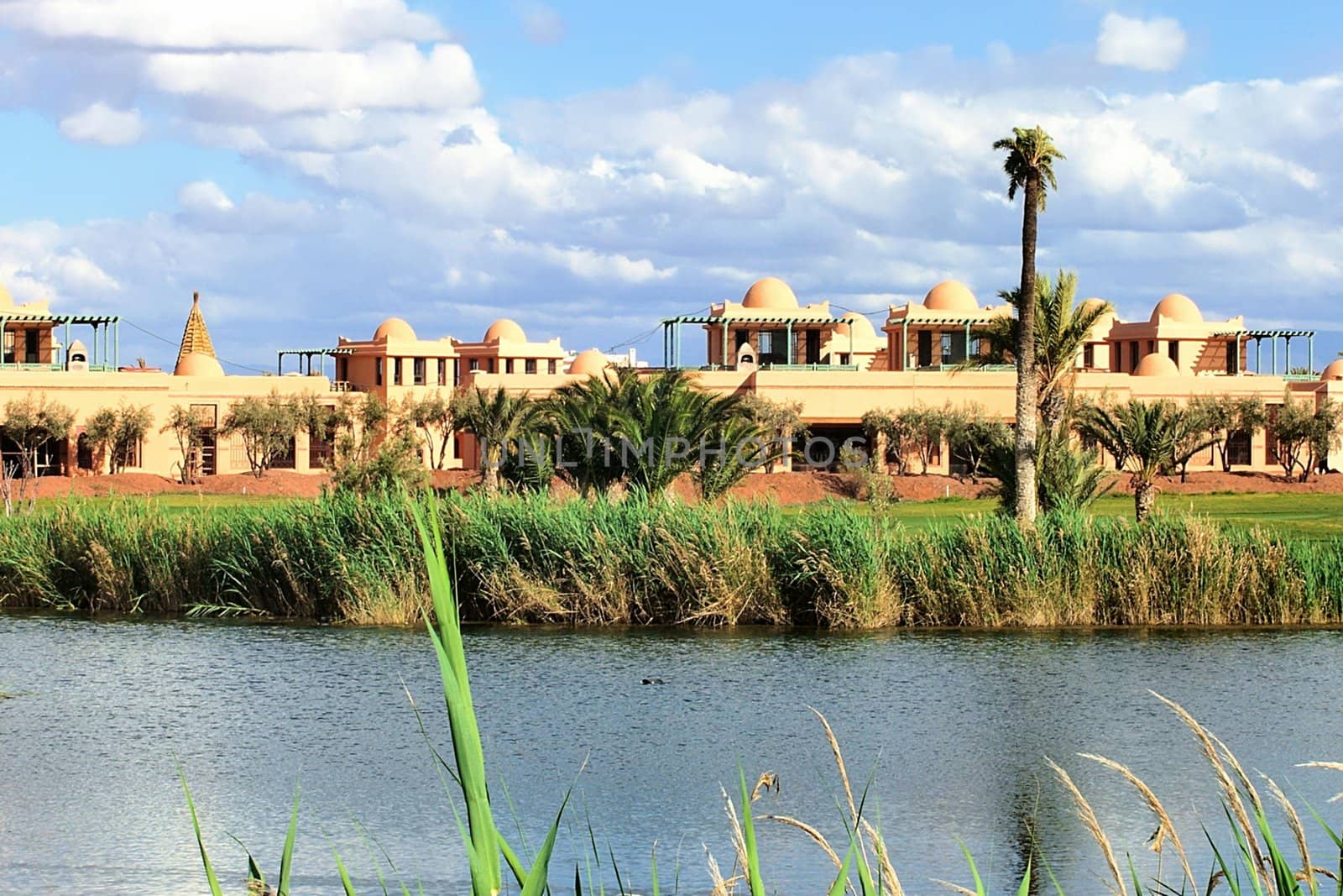 a view of a luxurious club house on a golf course of Marrakesh, Morocco