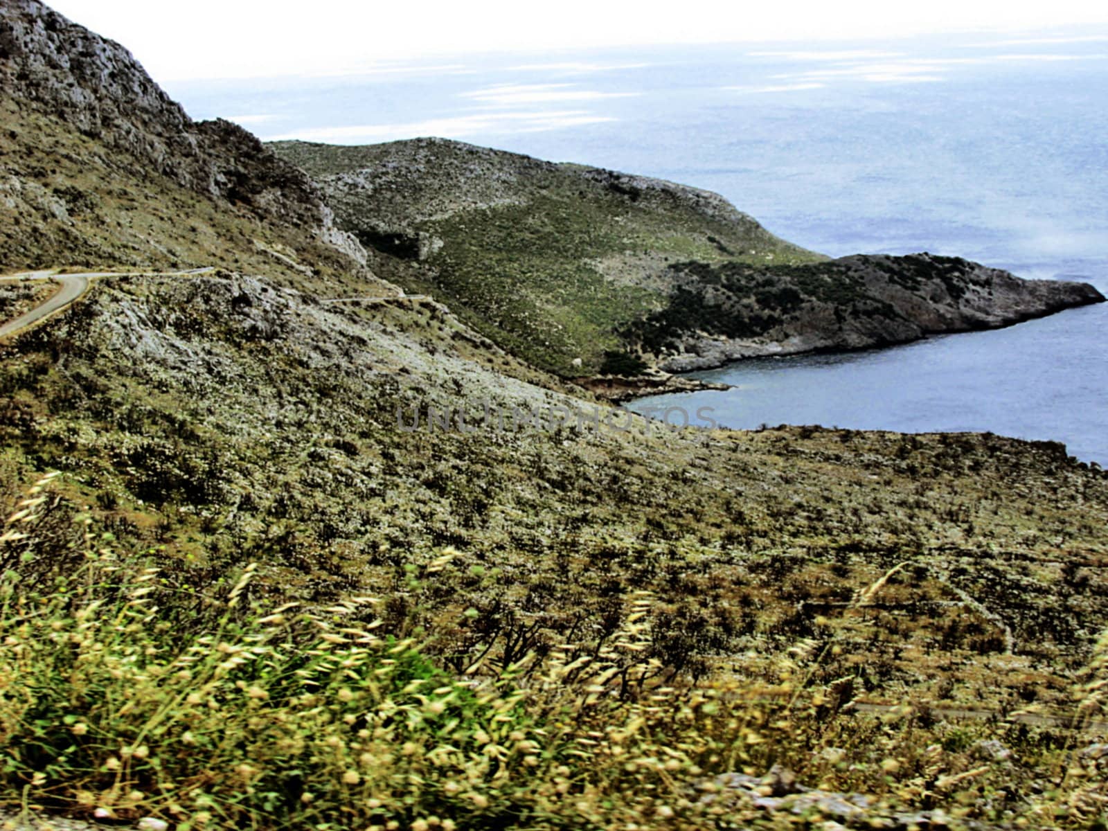 a burnt landscape on the coastline of the island of Kythera, Greece