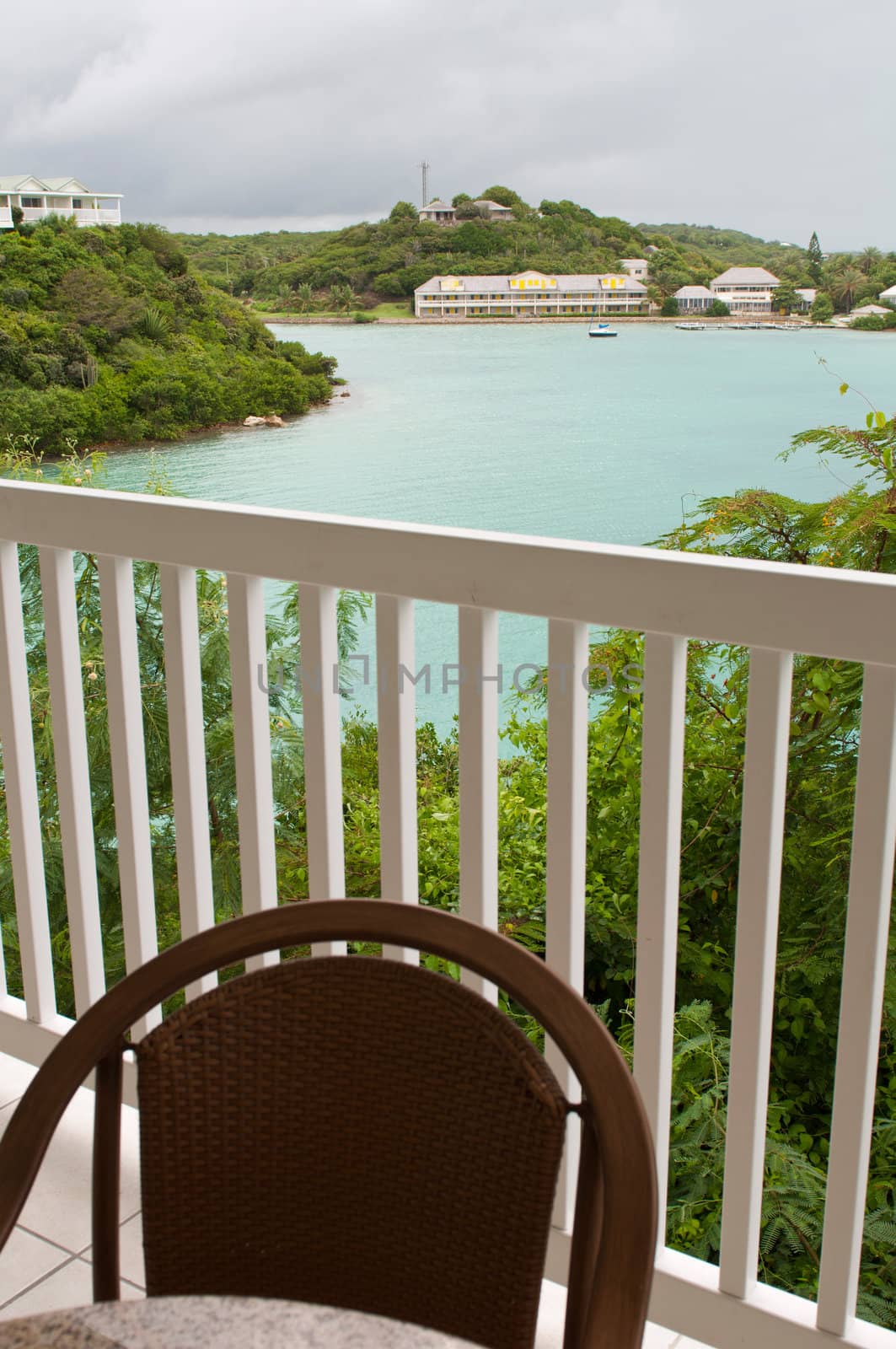 balcony view of Long Bay with resort villas and seascape in Antigua (overcast weather)