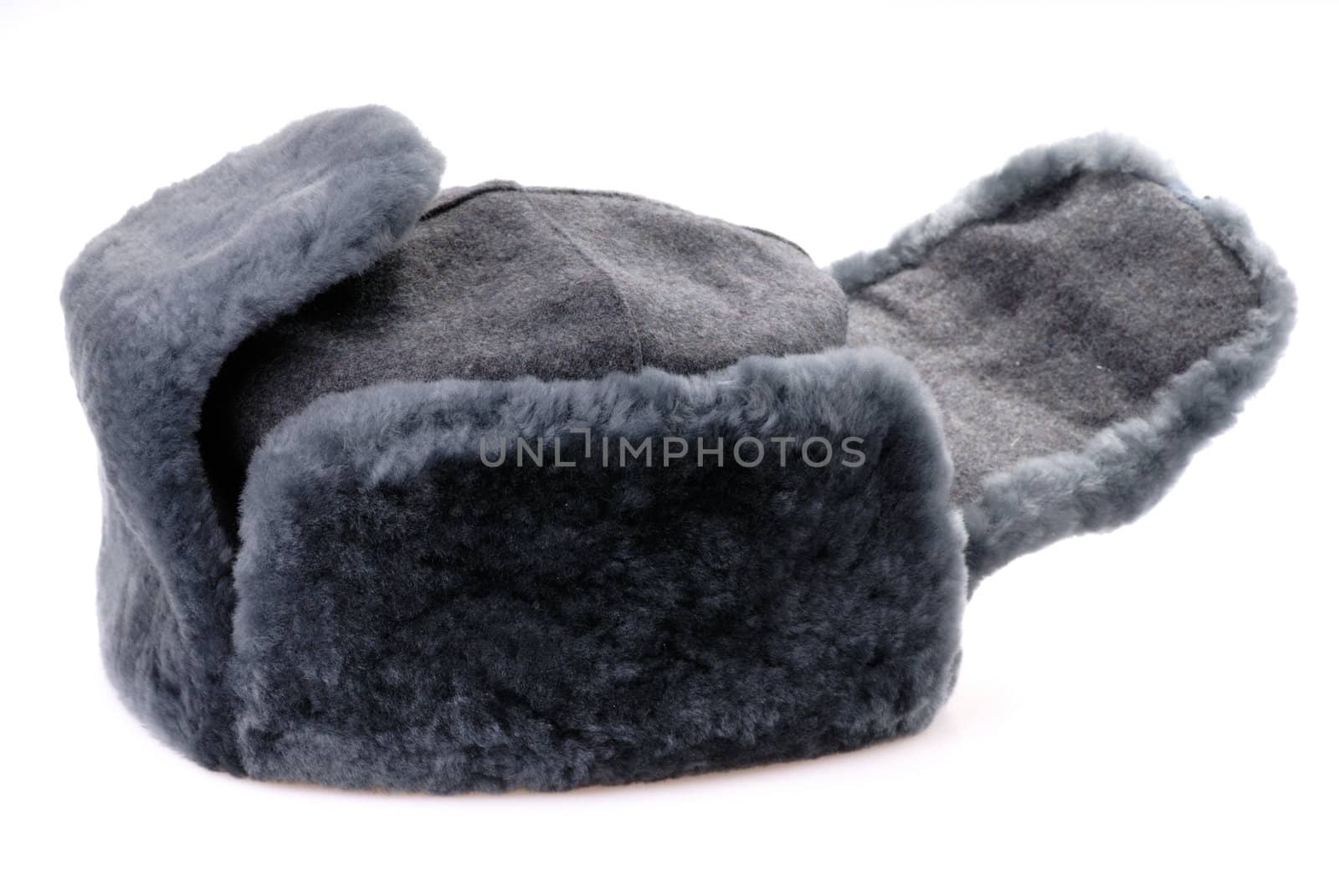 Russian fur hat with ear-flaps isolated by mahout