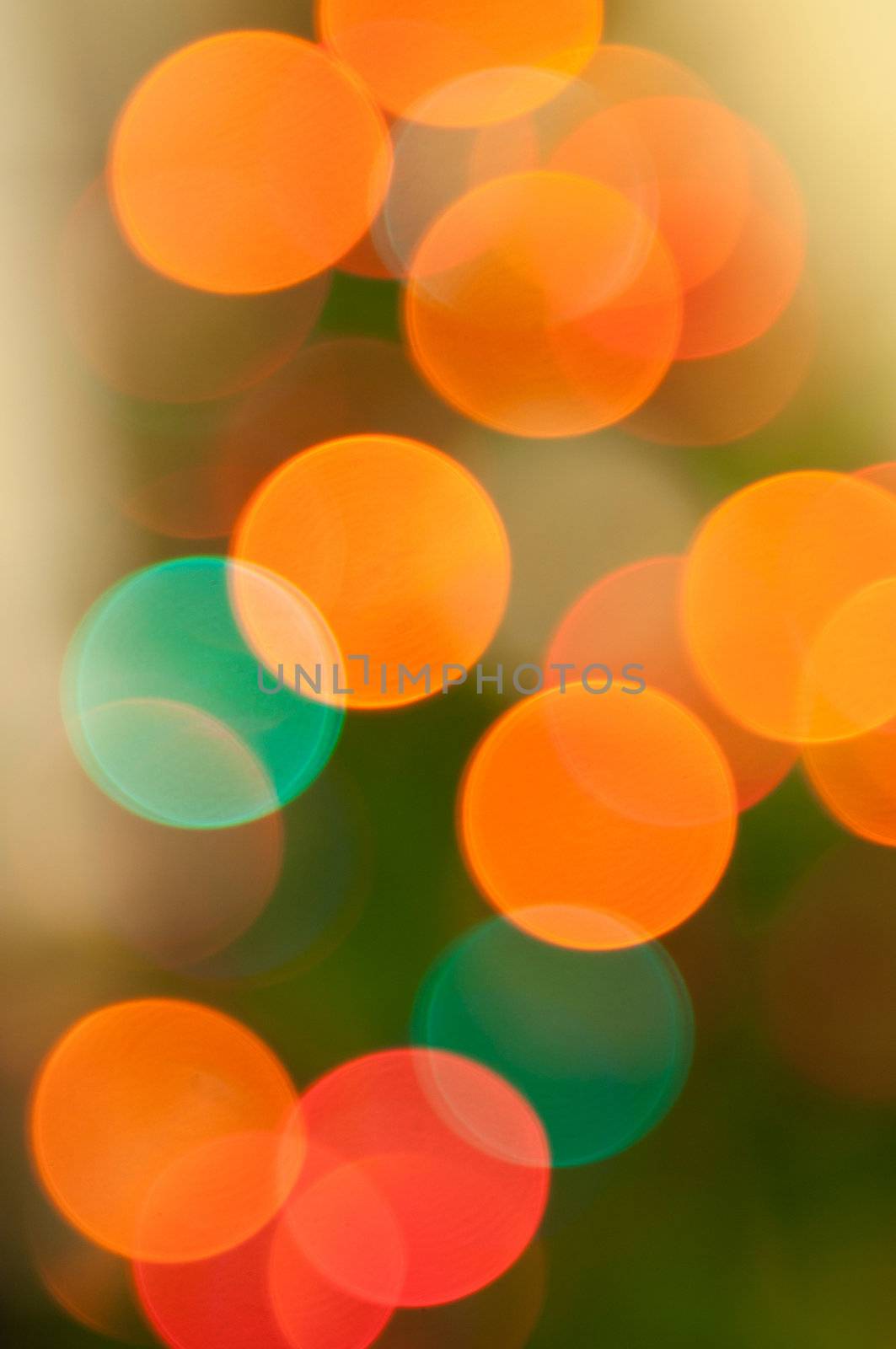 glowing multicolored Christmas lights (out of focus abstract background)