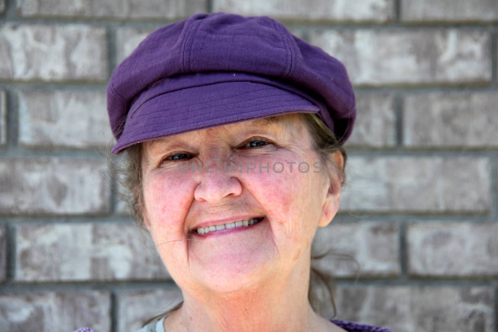 Mature irish woman posing outside.