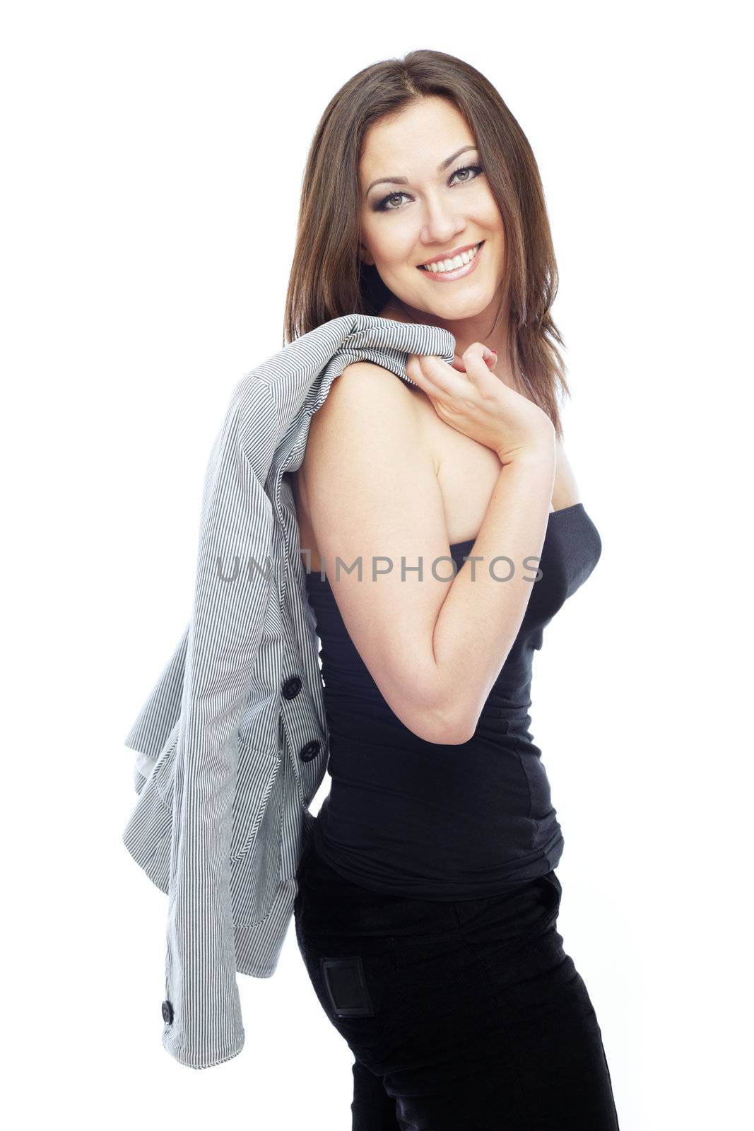 Successful smiling businesswoman with jacket on her sholder