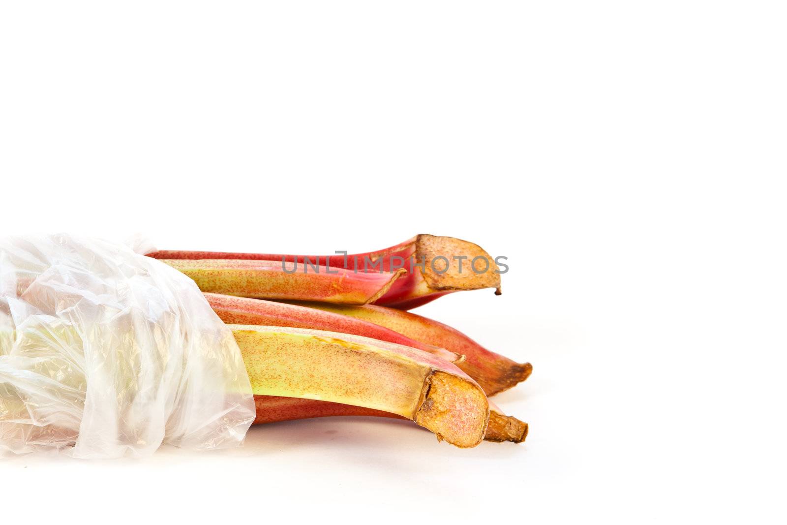 Bag of rhubarb  isolated on white background