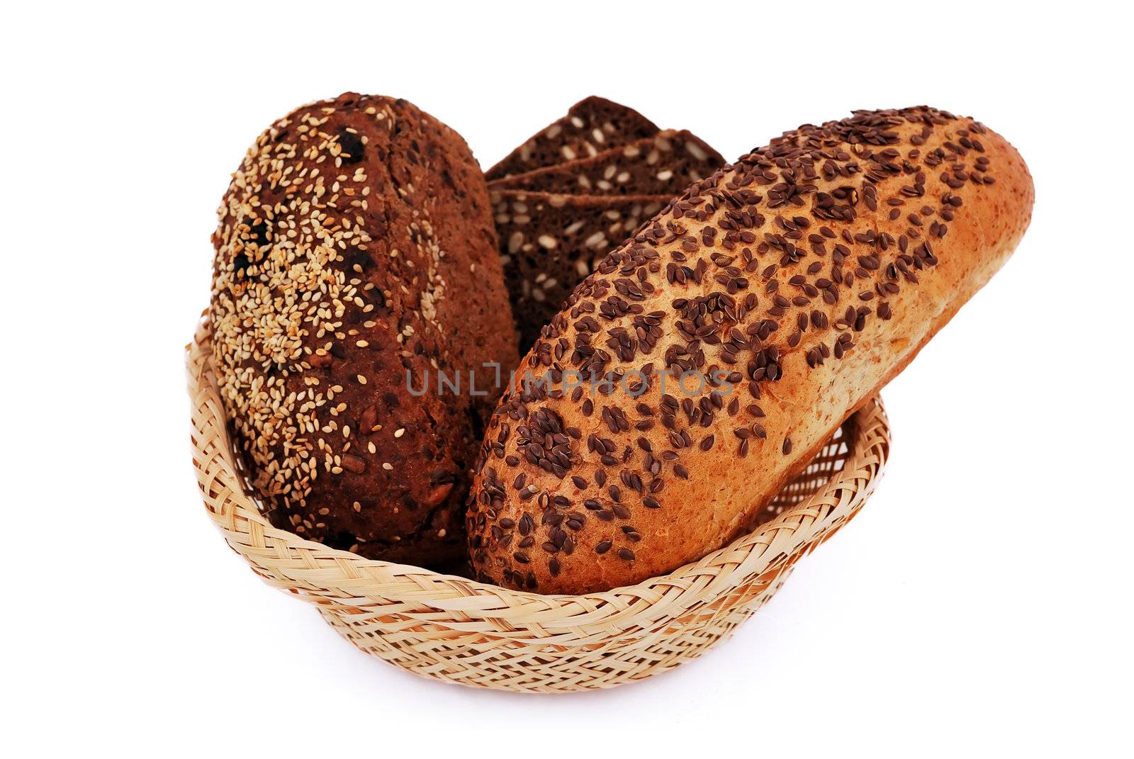 bread with sesame seeds in a wooden basket
