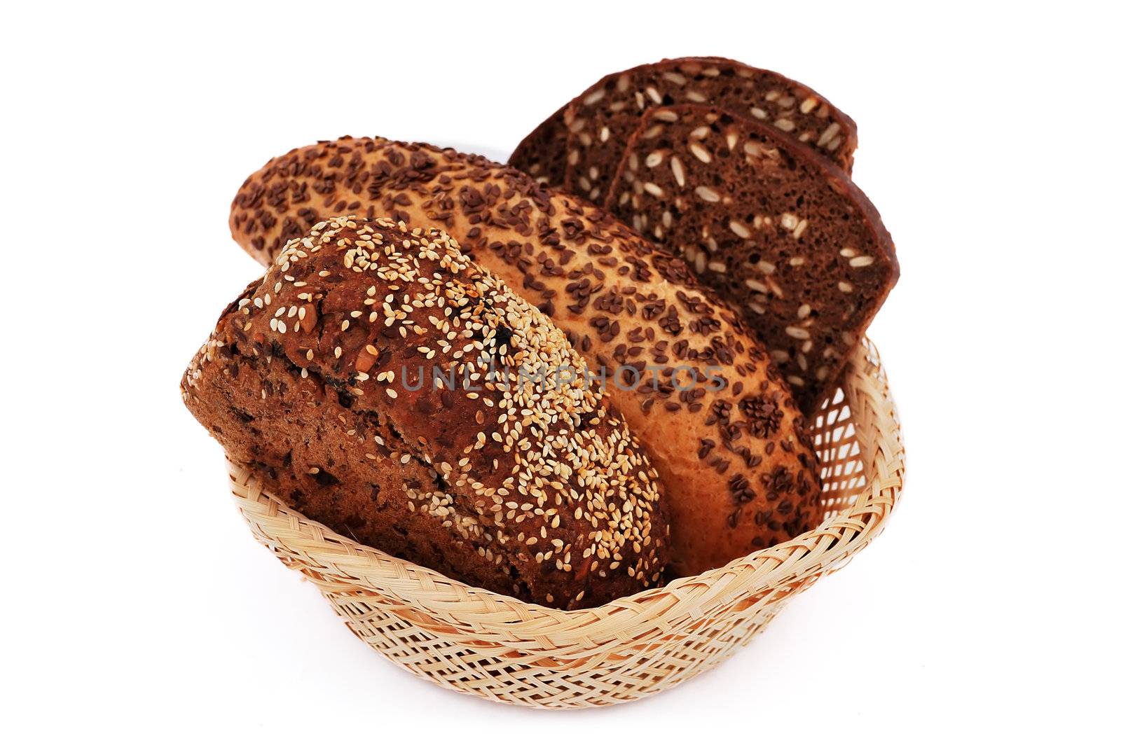 bread with sesame seeds in a wooden basket