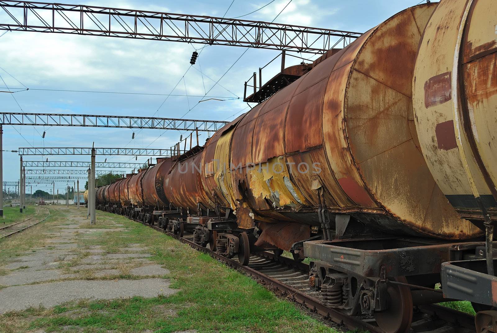 the train transports old tanks with oil and fuel