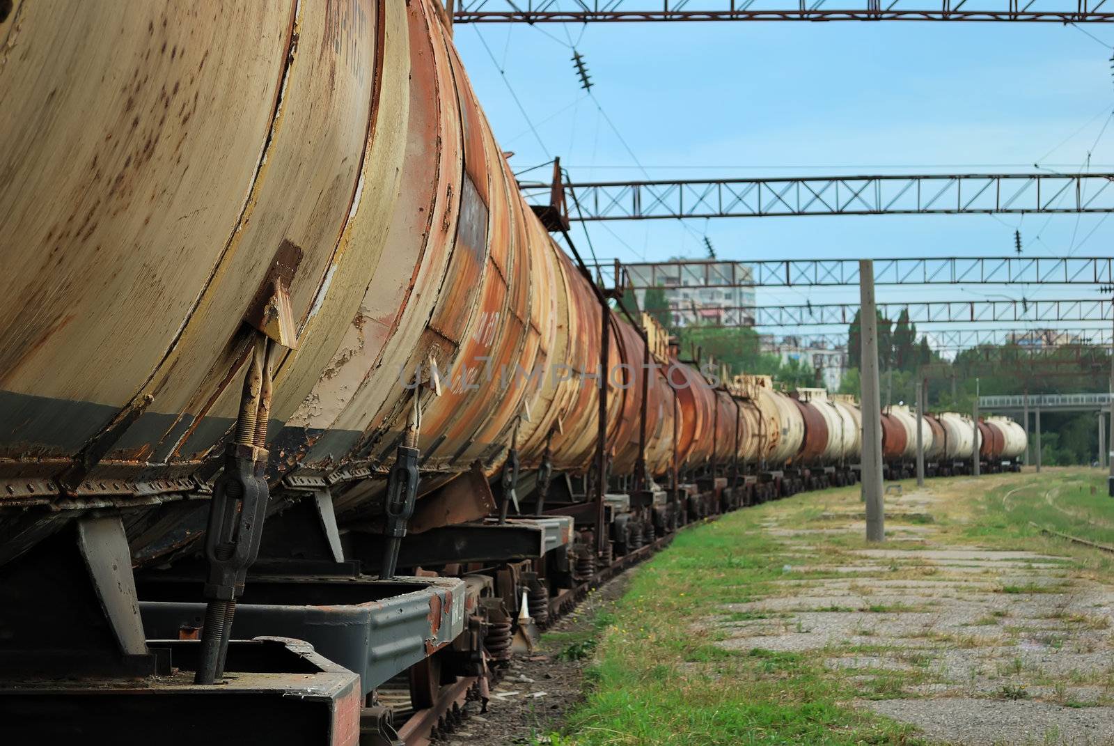 the train transports old tanks with oil and fuel
