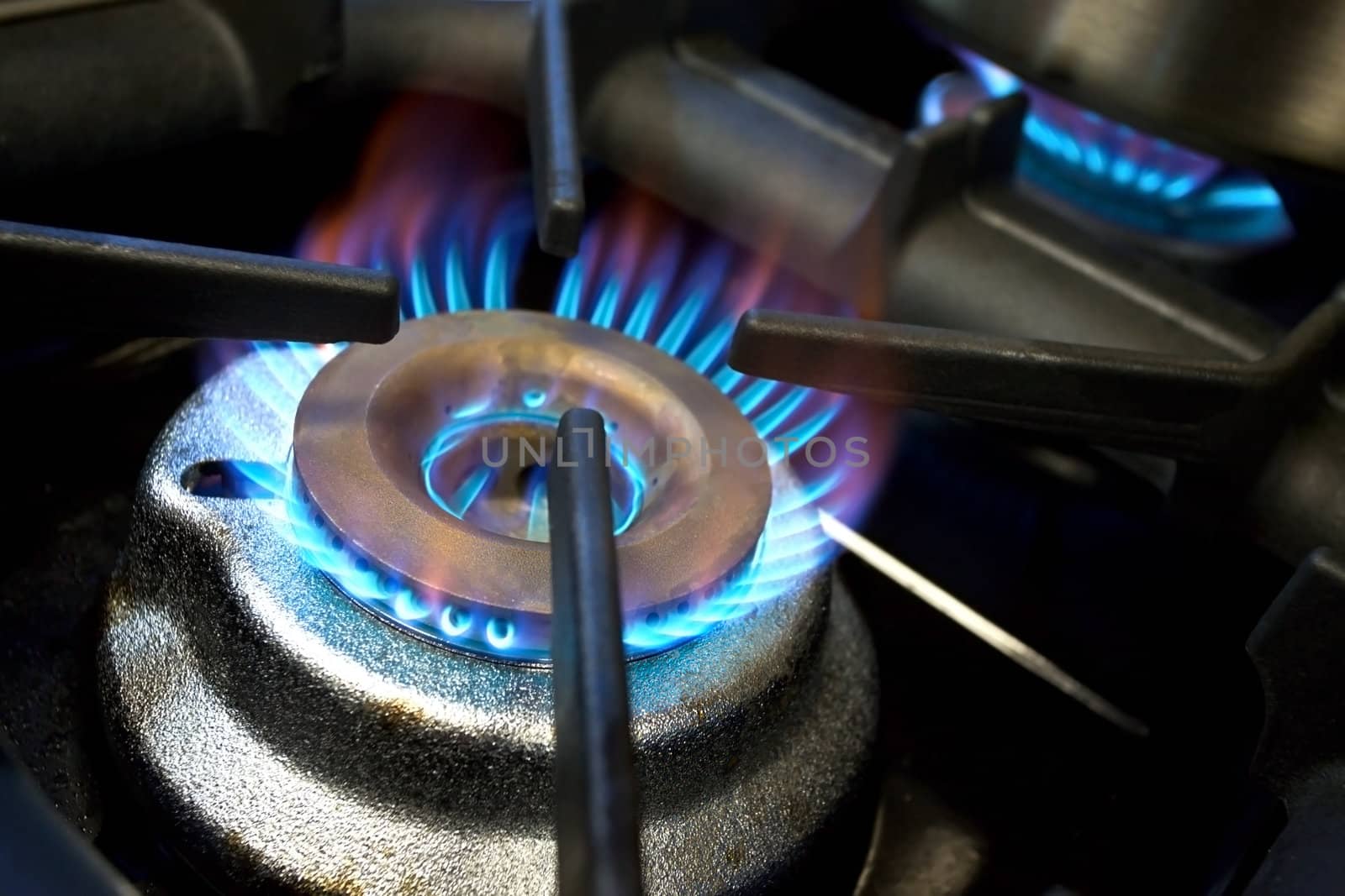Close-up of kitchen gas hob burning