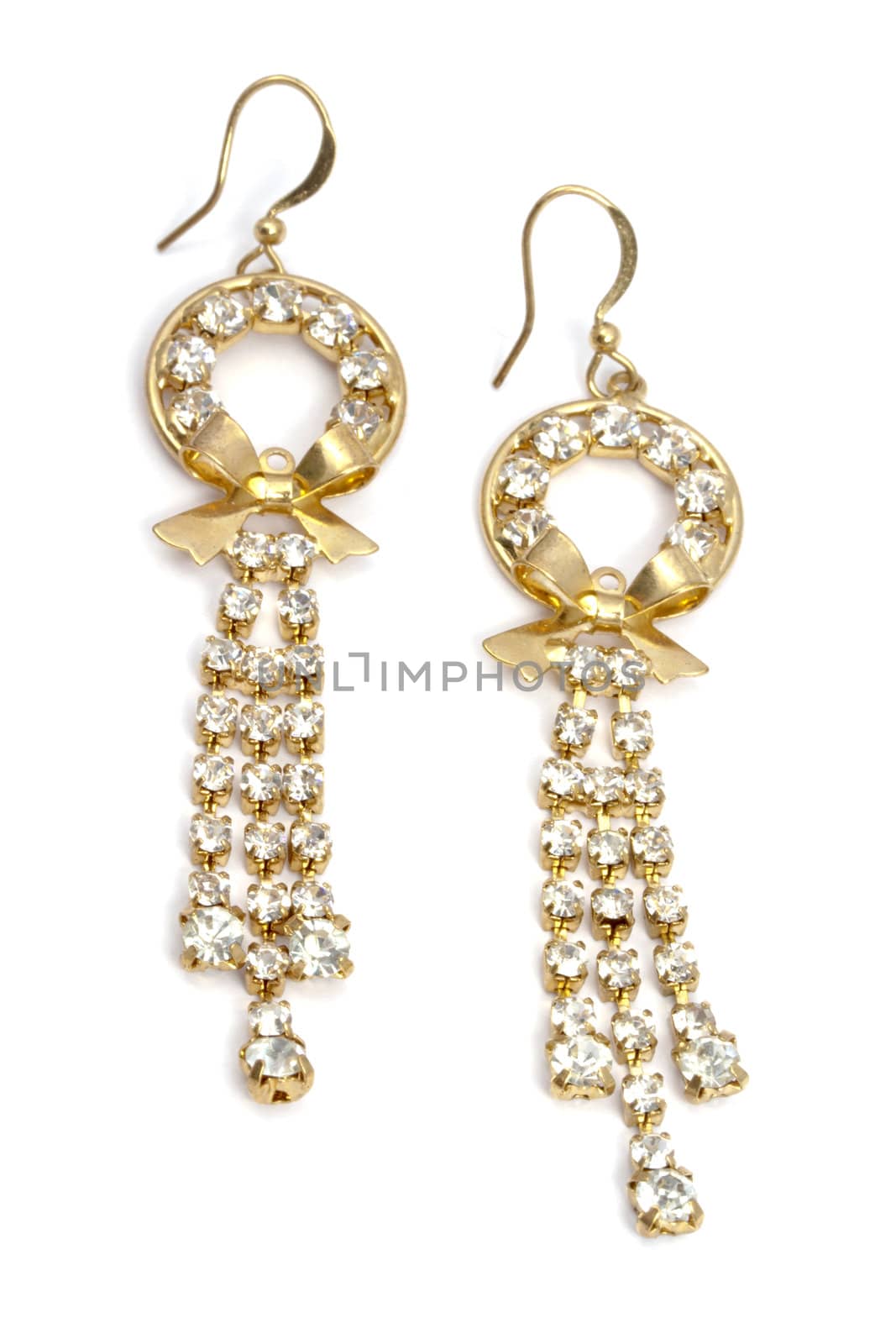 Beautiful fashion earrings closeup on white background 
