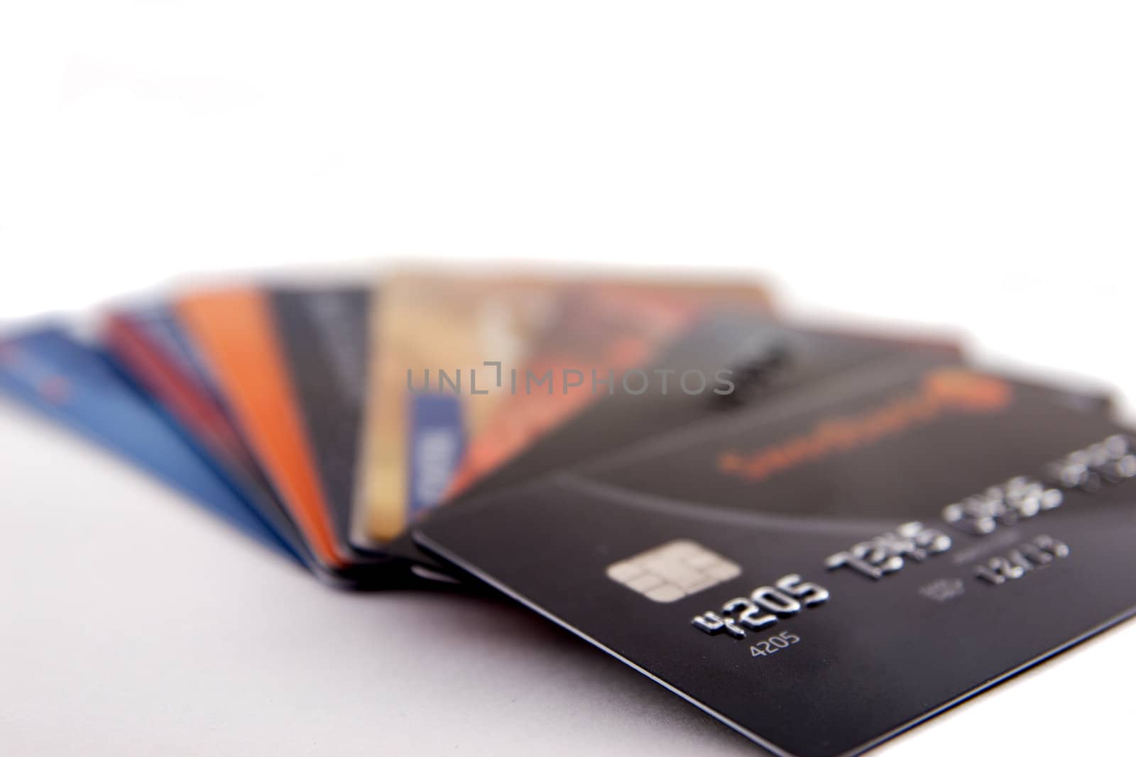 Stack of credit cards on white background
