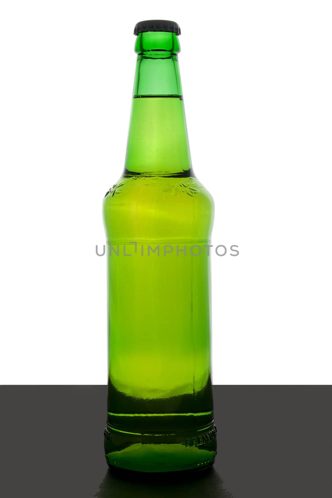 Green beer bottle with cap and no labels