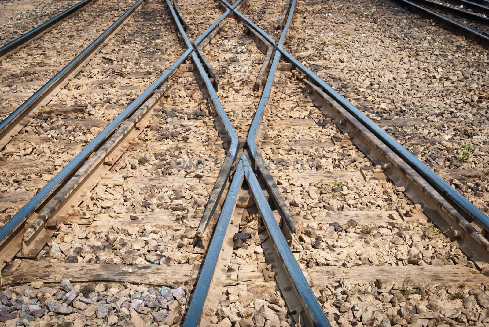 Railway for local trains taken from front view with cross over
