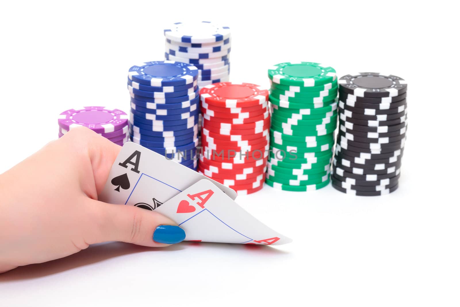 Hand with two Aces and Stacks Poker Chips by Discovod