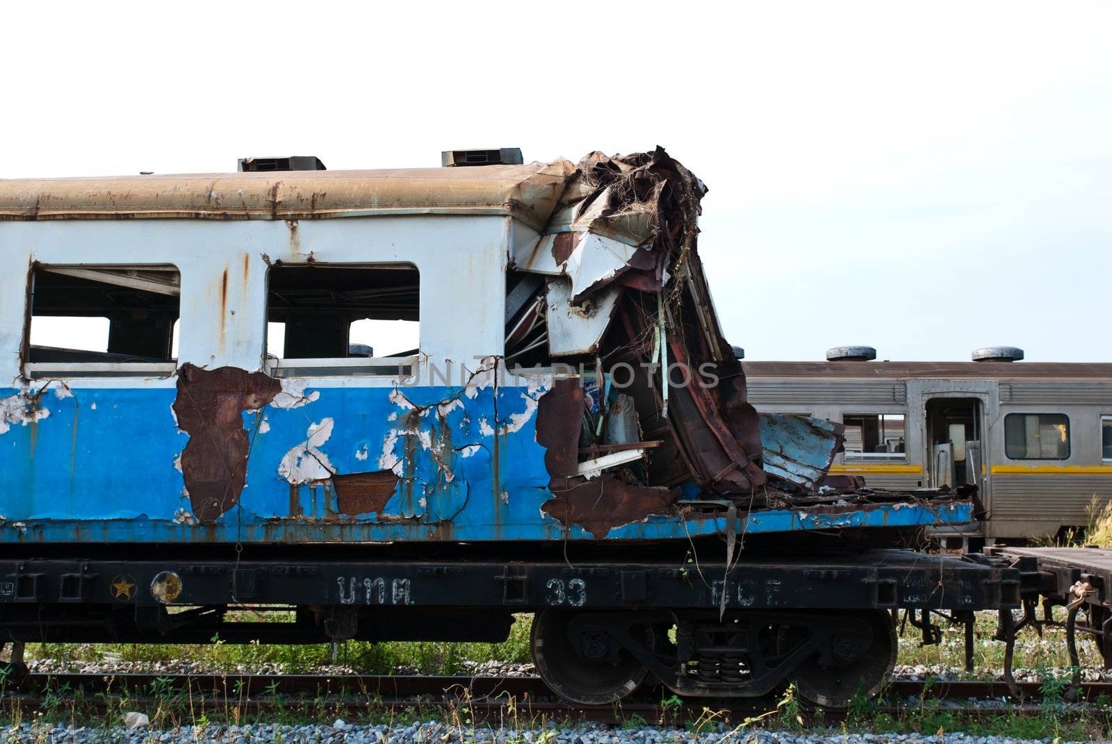 A wreckage of crashed or damaged train taken from train yard taken on sunny day, can be use for safety related communications
