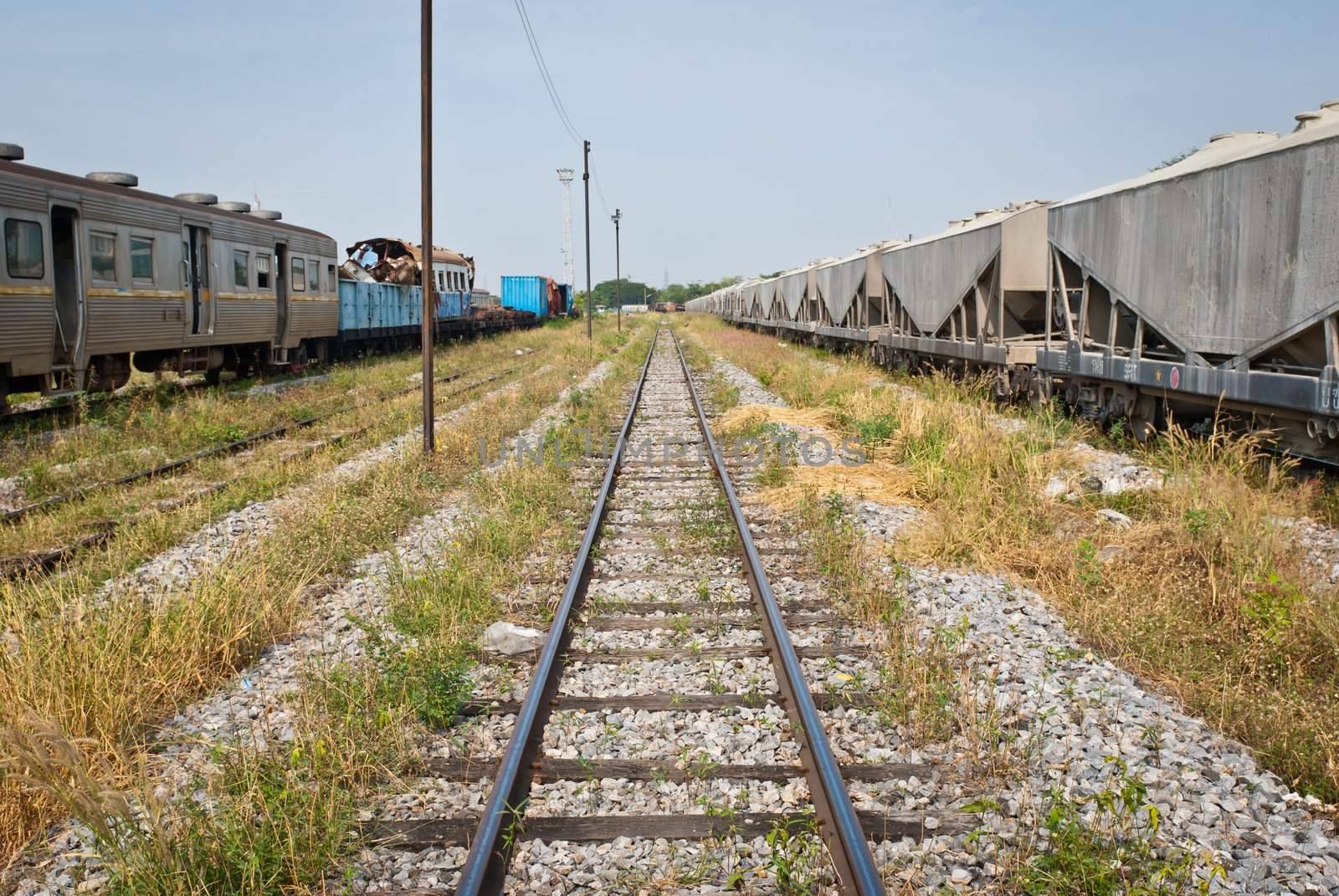 Railway looking forward with train wreckage on the left, taken on sunny day, can be use for safety related communication
