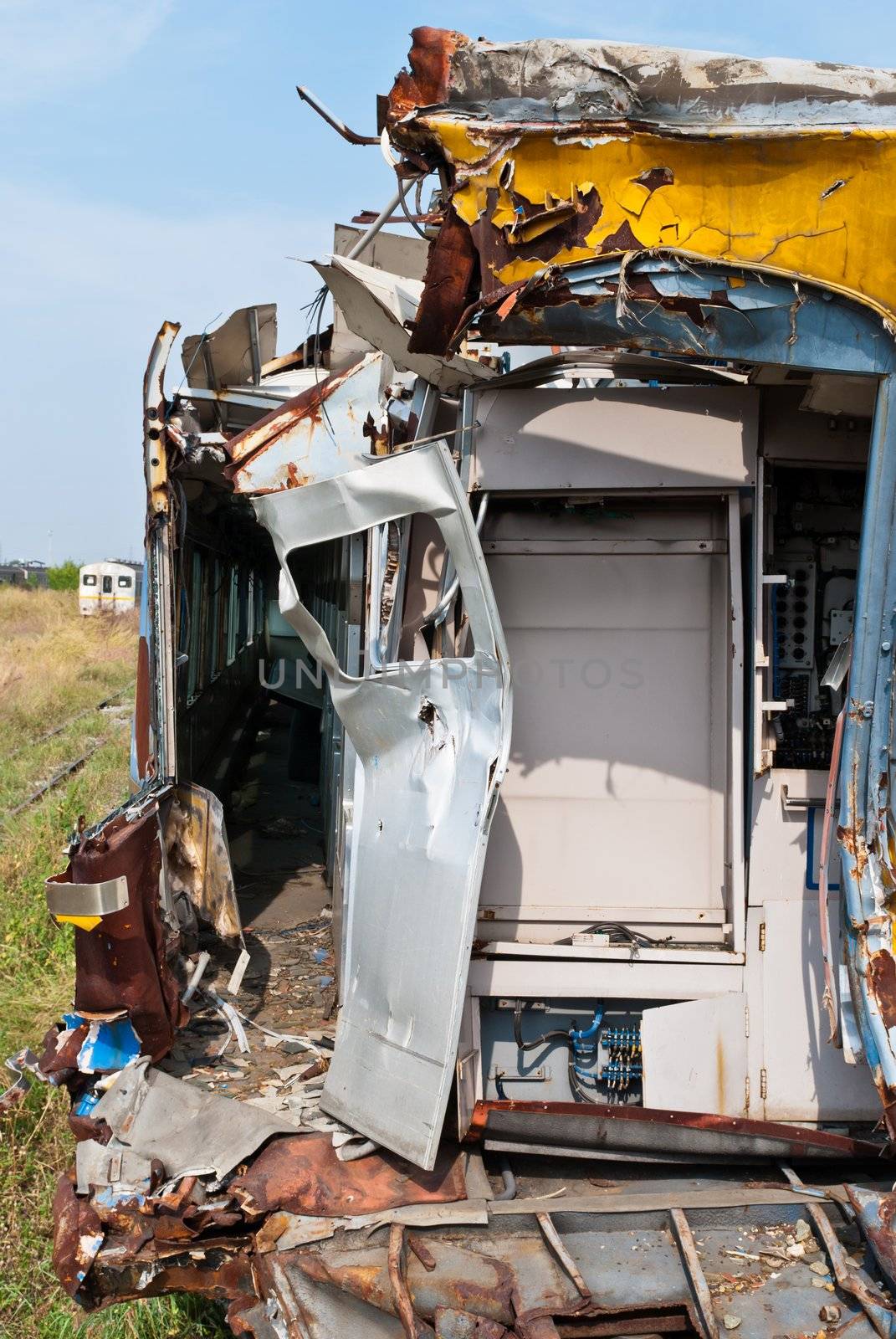 A wreckage of crashed or damaged train taken from train yard taken on sunny day, can be use for safety related communications
