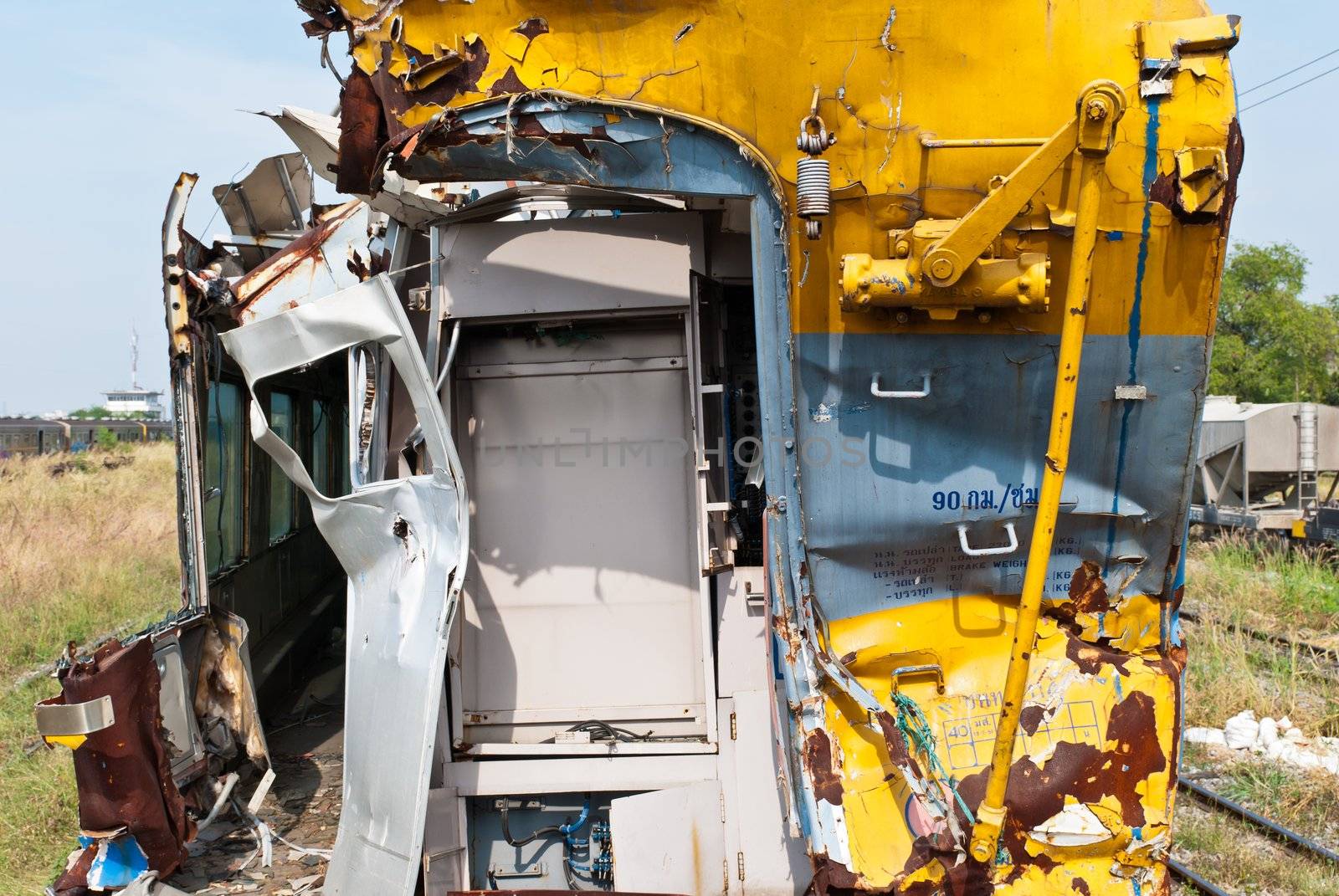 A wreckage of crashed or damaged train taken from train yard taken on sunny day, can be use for safety related communications
