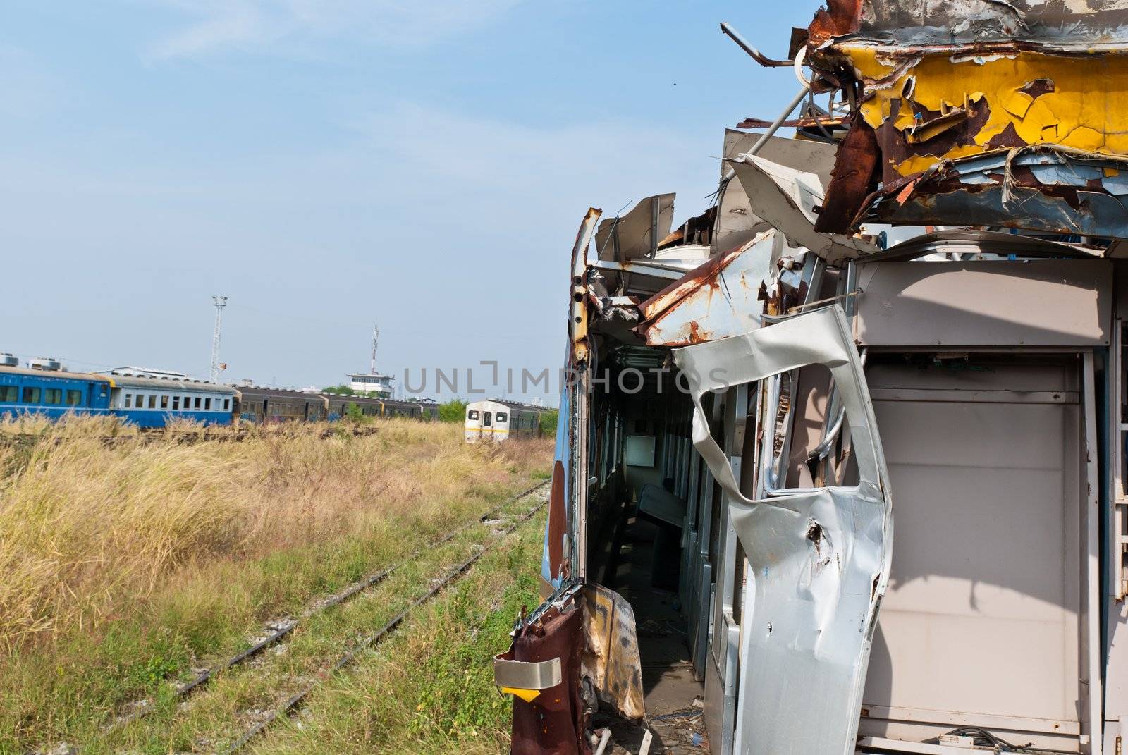 A wreckage of crashed or damaged train taken from train yard taken on sunny day, can be use for safety related communications
