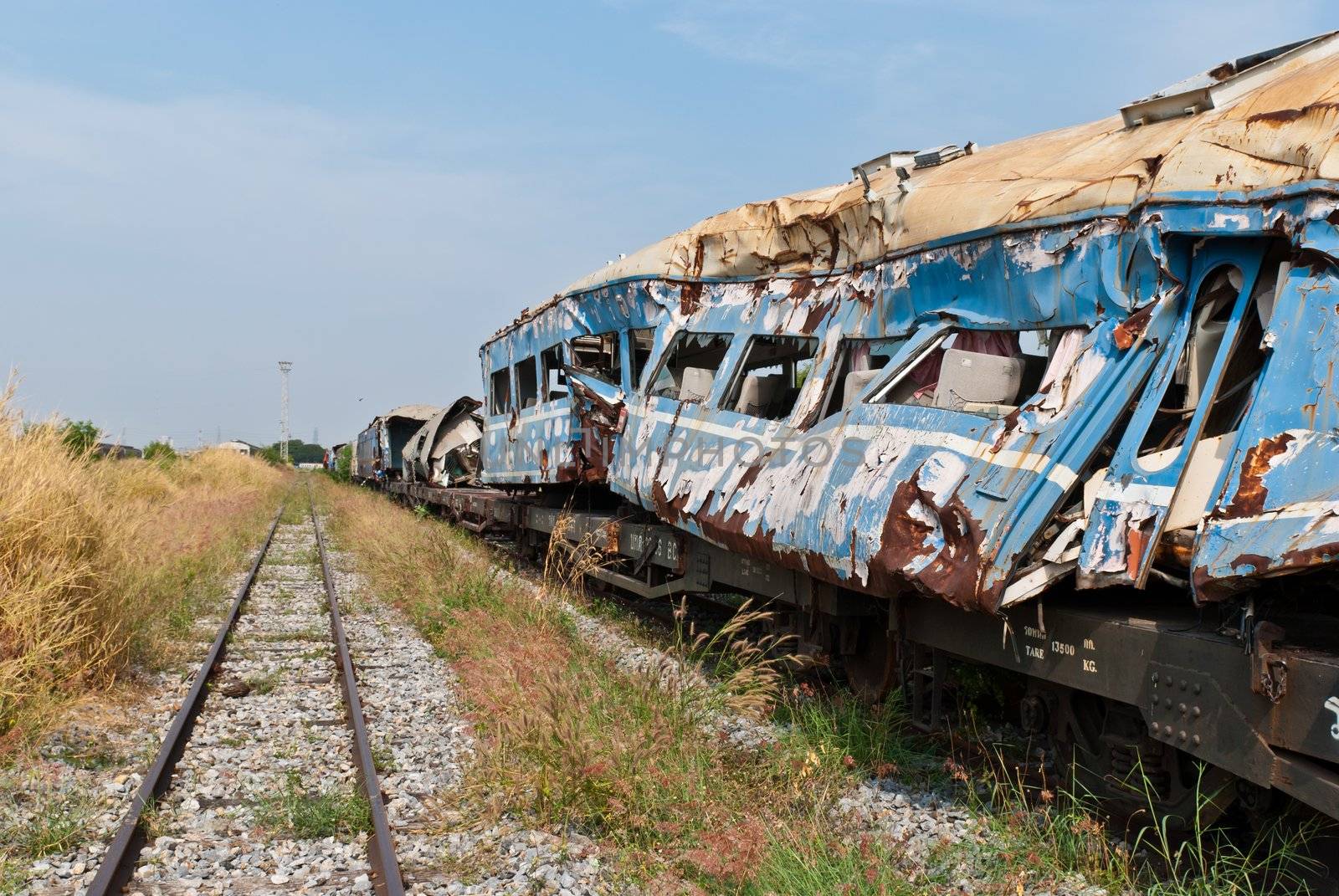 A wreckage of crashed or damaged train taken from train yard taken on sunny day, can be use for safety related communications
