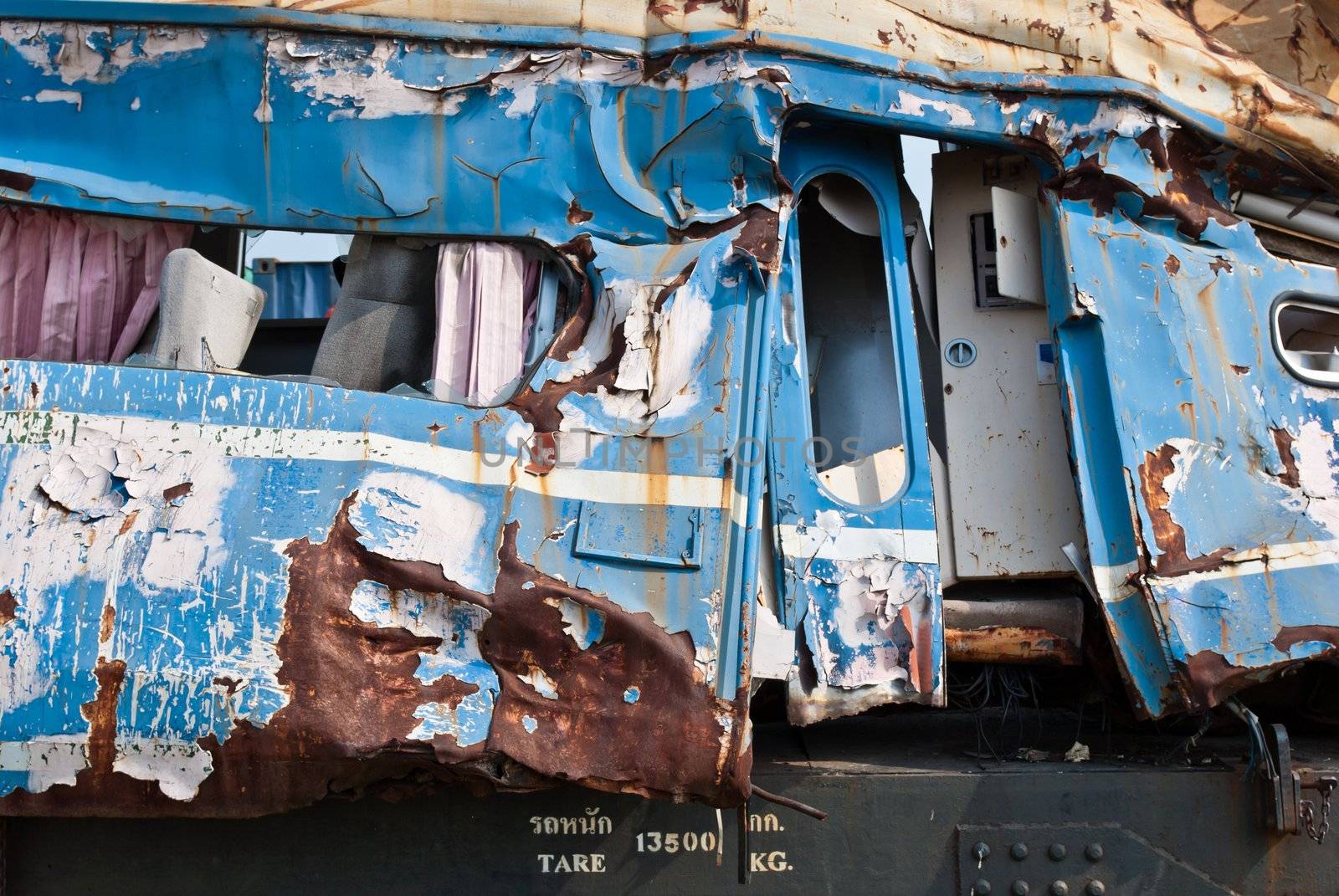 A wreckage of crashed or damaged train taken from train yard taken on sunny day, can be use for safety related communications
