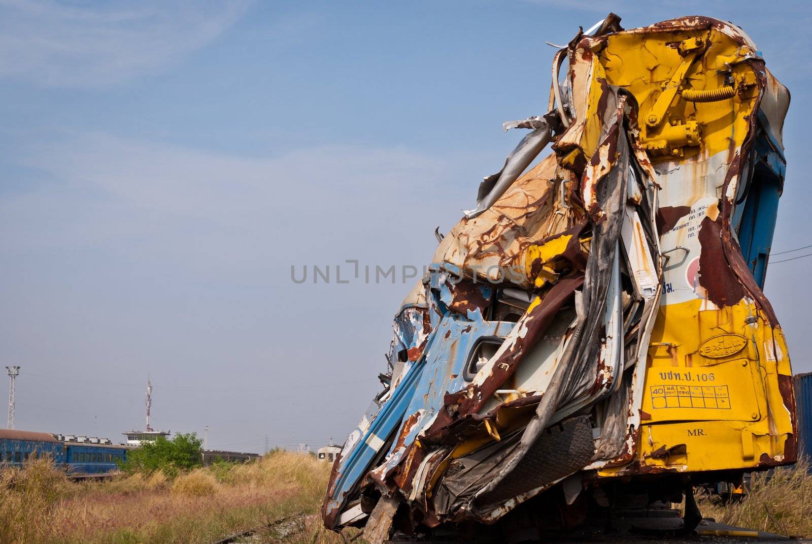 A wreckage of crashed or damaged train taken from train yard taken on sunny day, can be use for safety related communications
