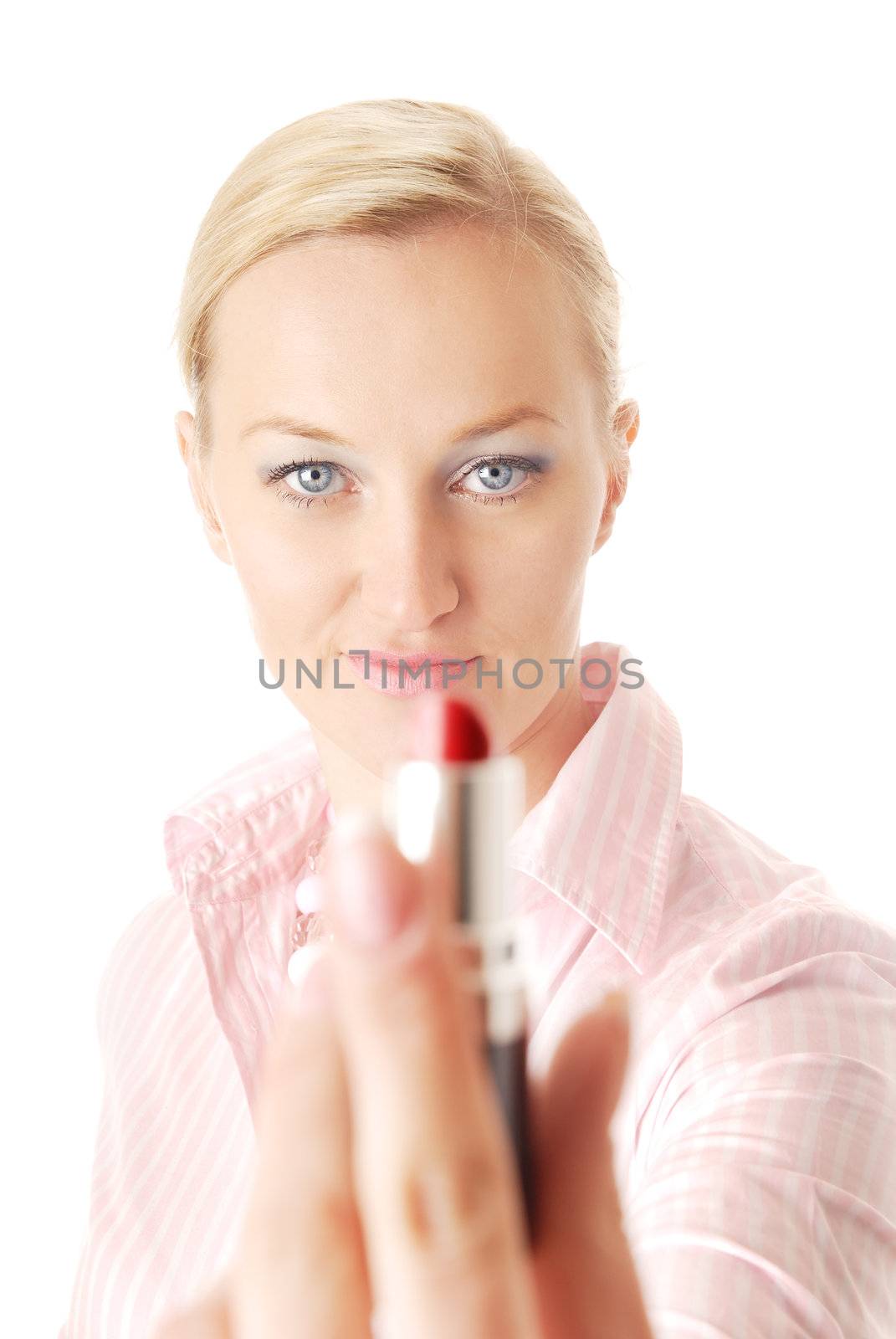 Close-up portrait of the blonde giving the lipstick