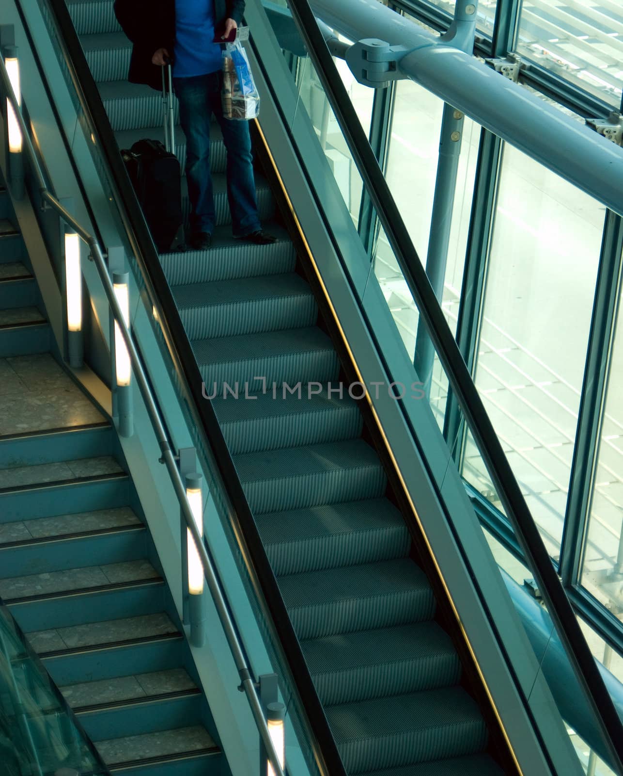 escalatorl of airport gate with architecture