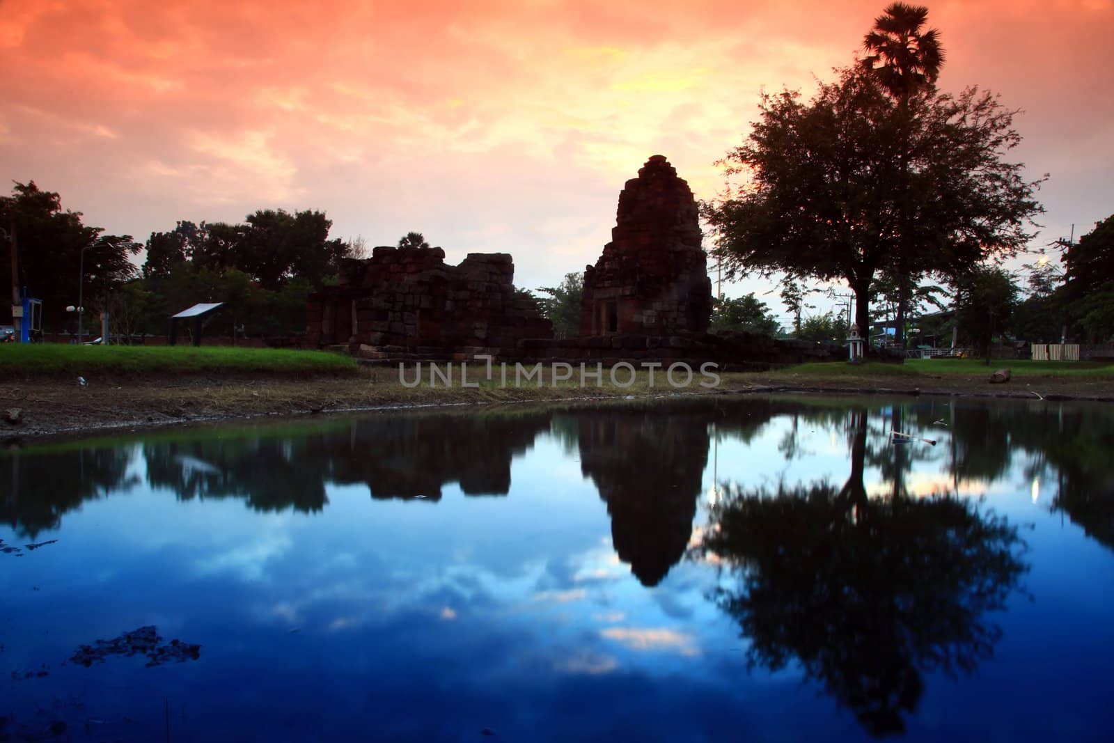 Silhouette of indian style medical center ruin at dusk