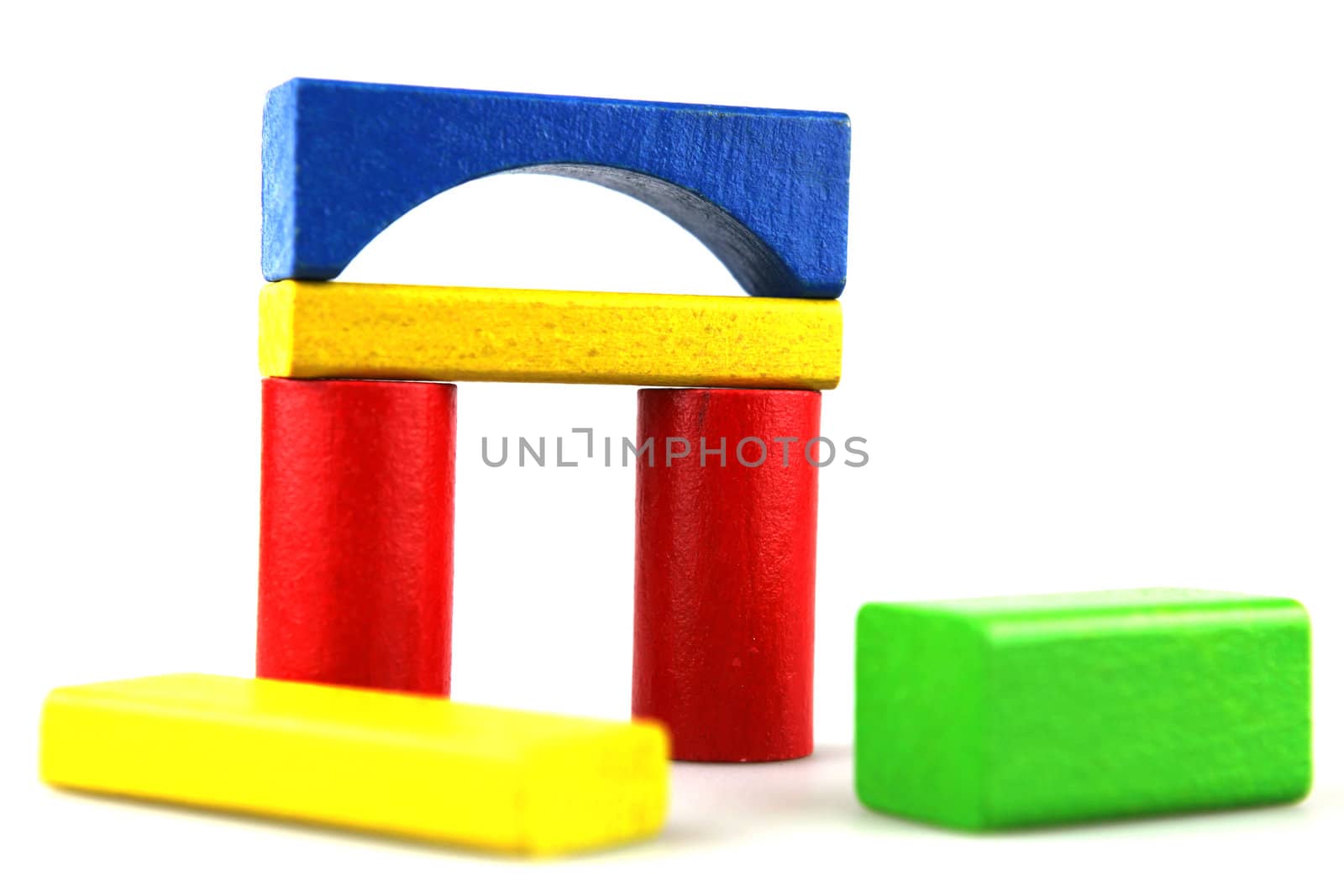 Wooden building blocks isolated on white background