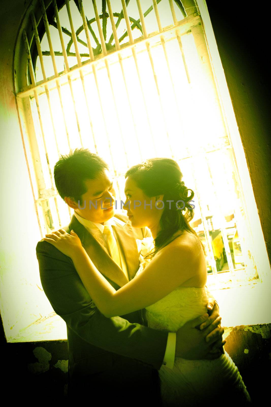 romantic scene of bride and groom,each other seeing eyes 