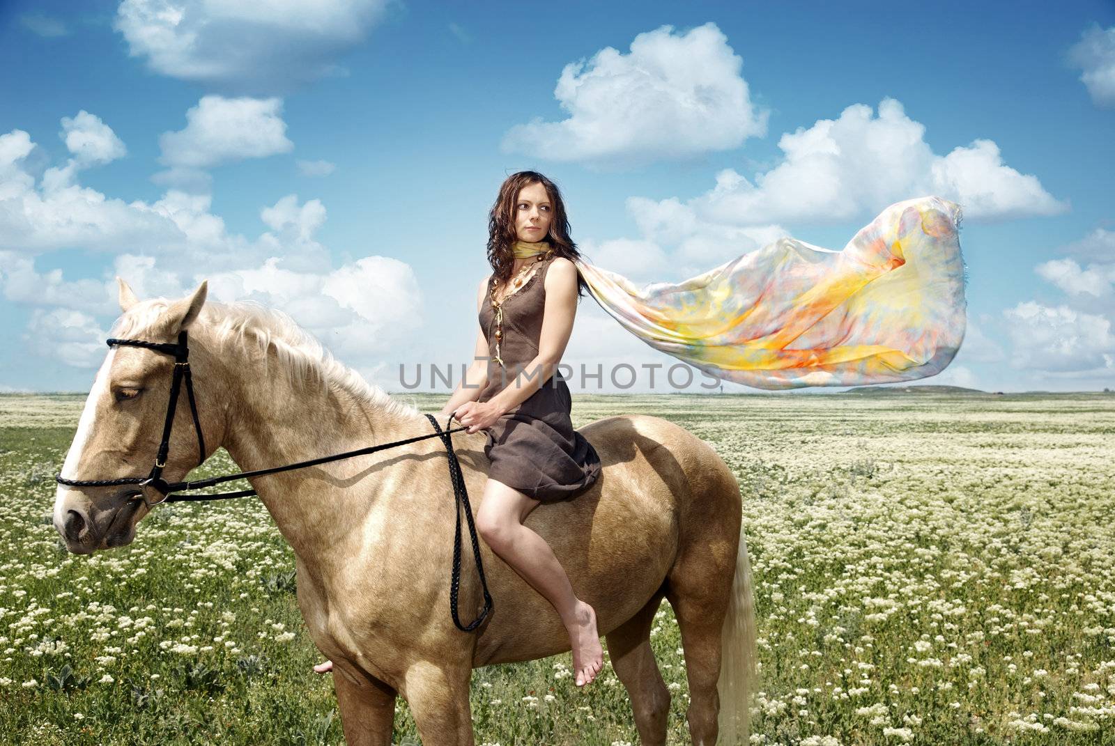 Lady with colorful scarf sitting on the serene horse