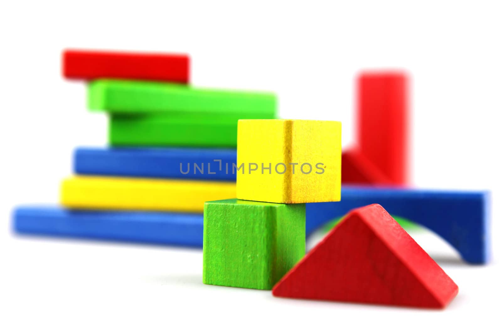 Wooden building blocks isolated on white background