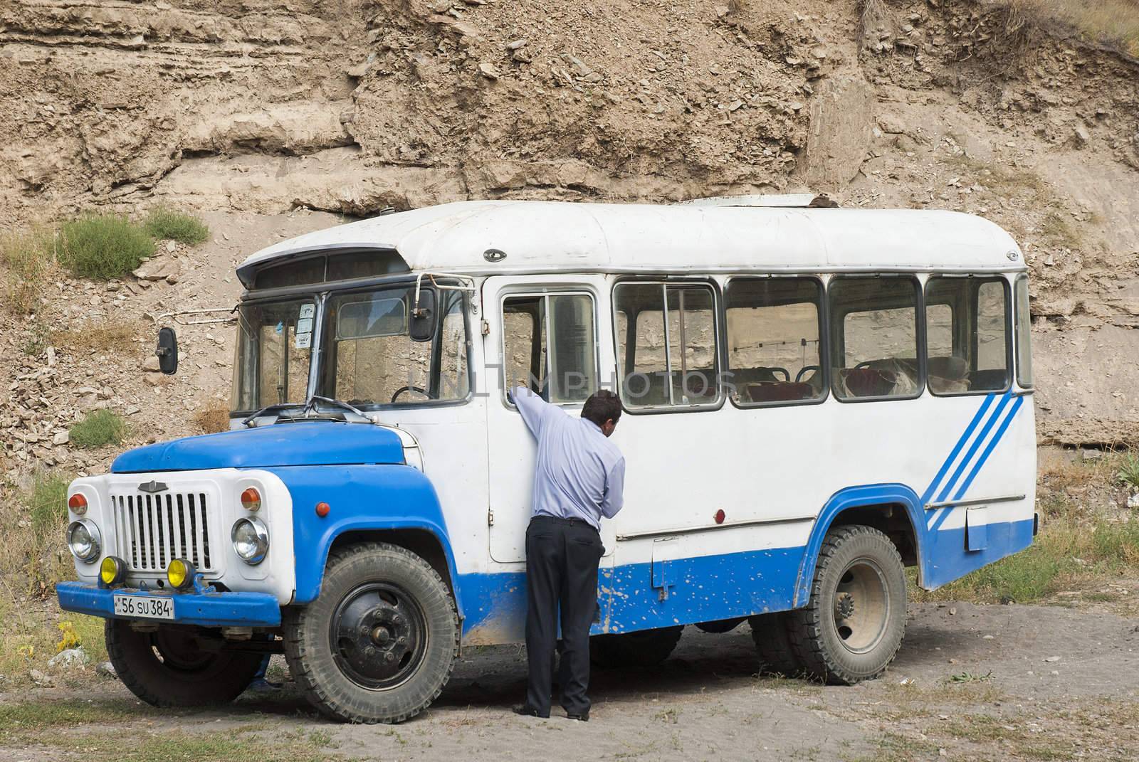vintage bus in armenia by jackmalipan