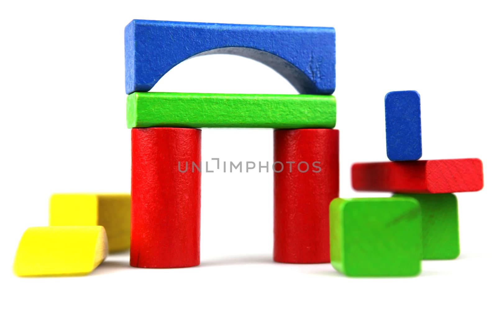 Wooden building blocks isolated on white background