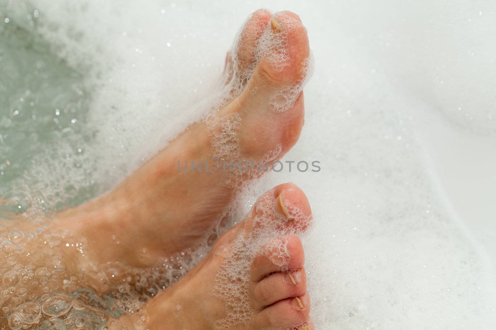 the water massage of tired feet