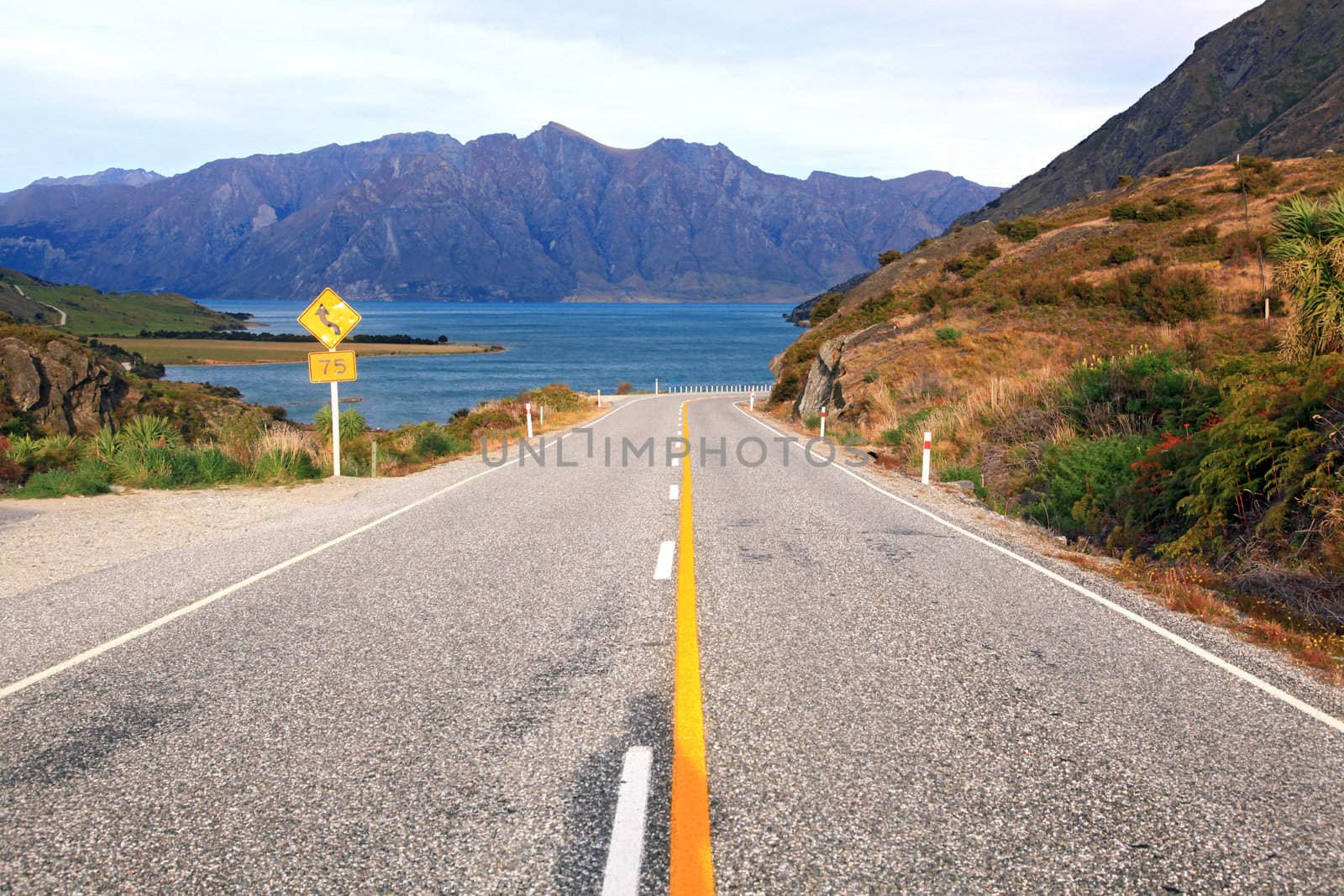 Perspective of Highway Road Freeway stretching to Lake Hawea in Wanaka New Zealand