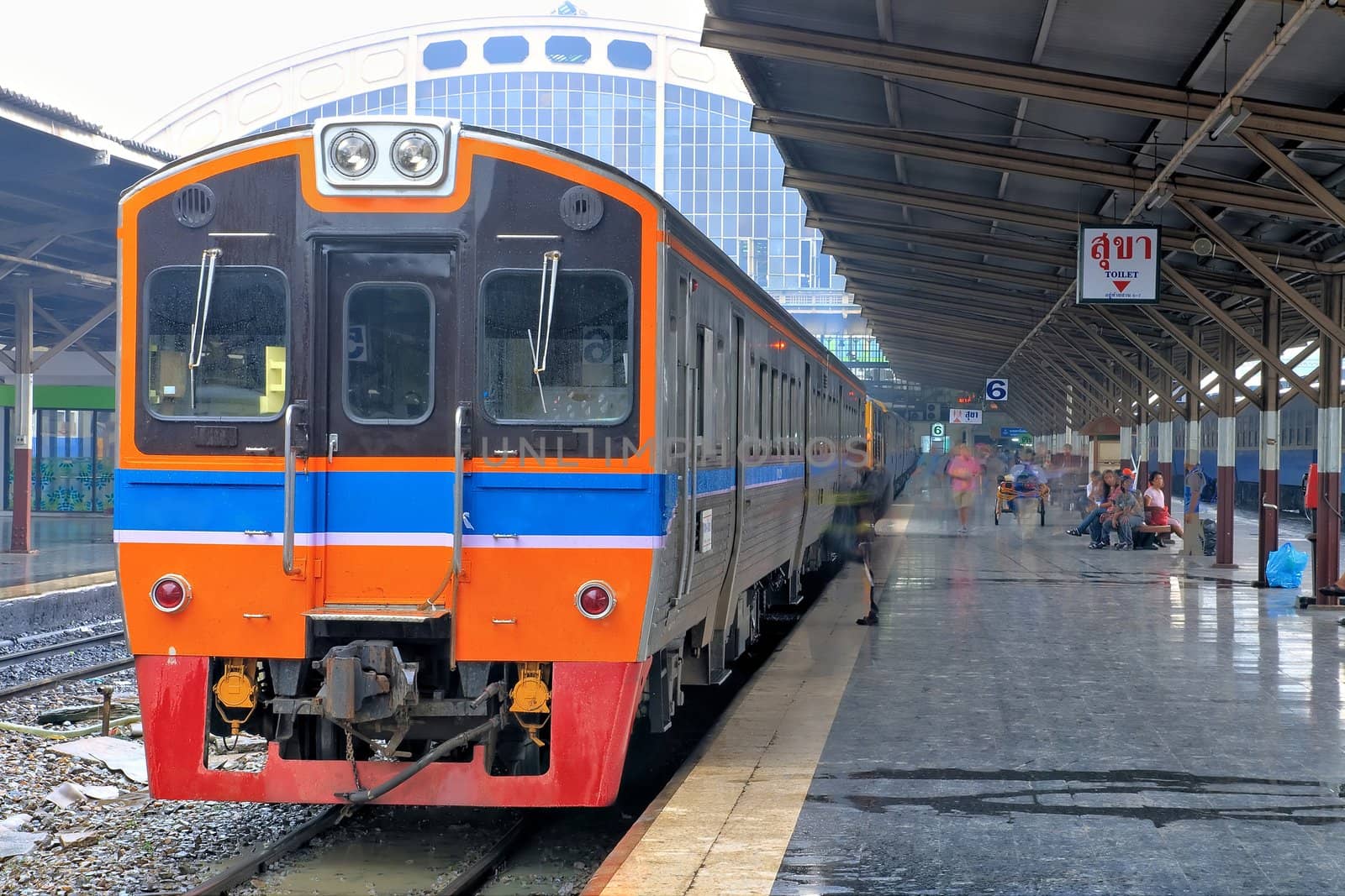 Thai Red Sprinter train, Diesel locomotive, on Bangkok railway station Thailand