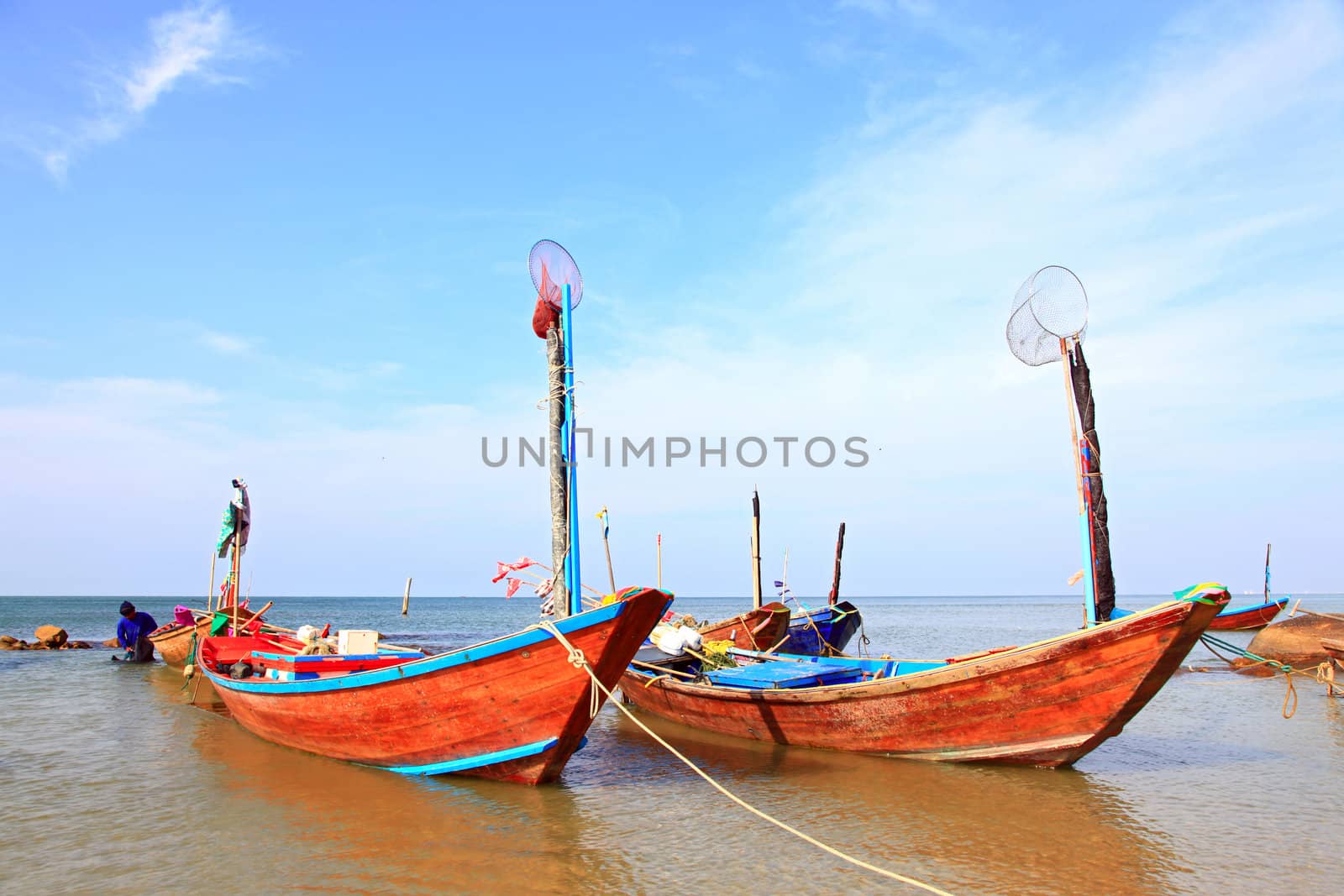 fisherman long tail boat park at the Rayong beach in Thailand, closeup